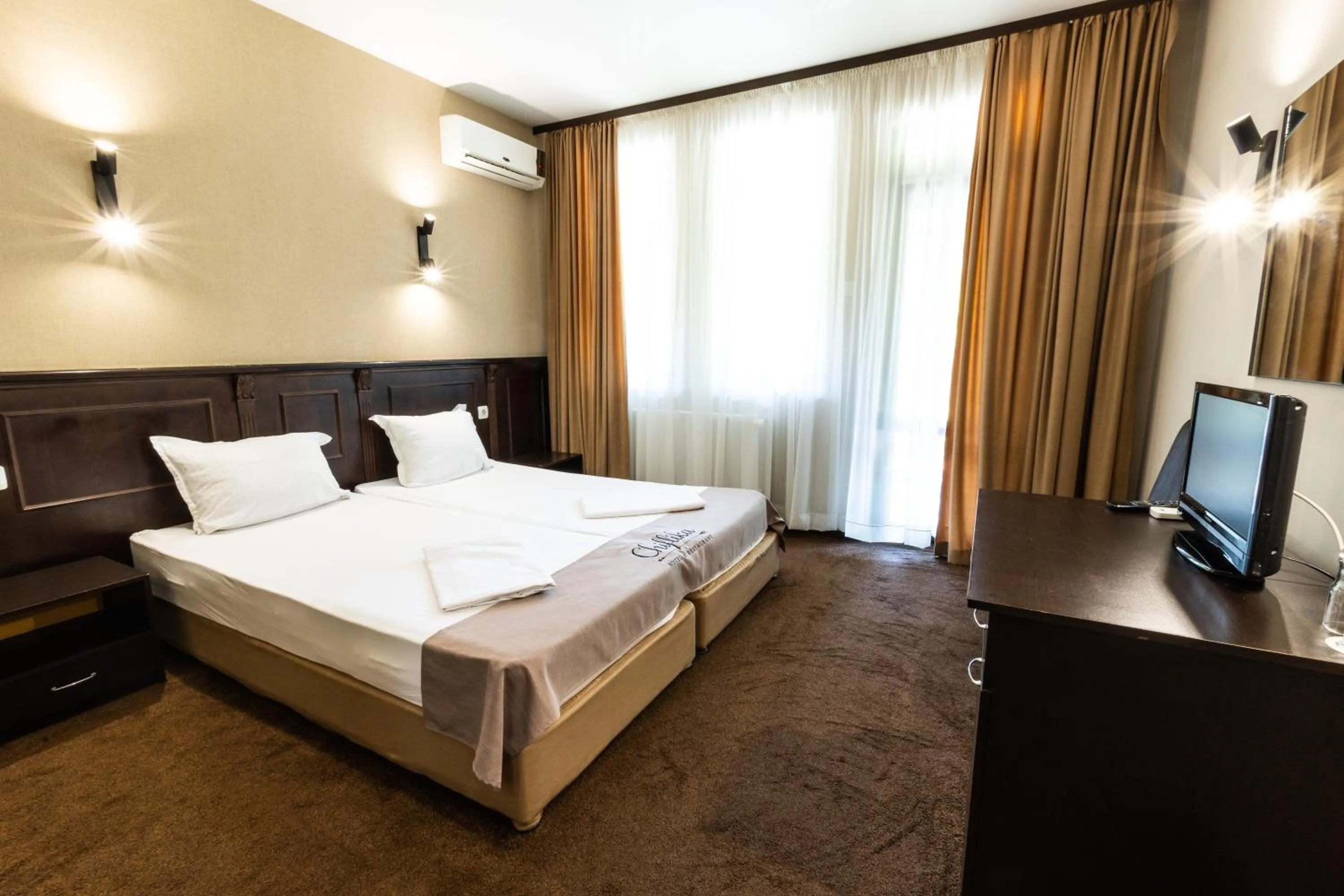 Bed in Chiflika Family Hotel