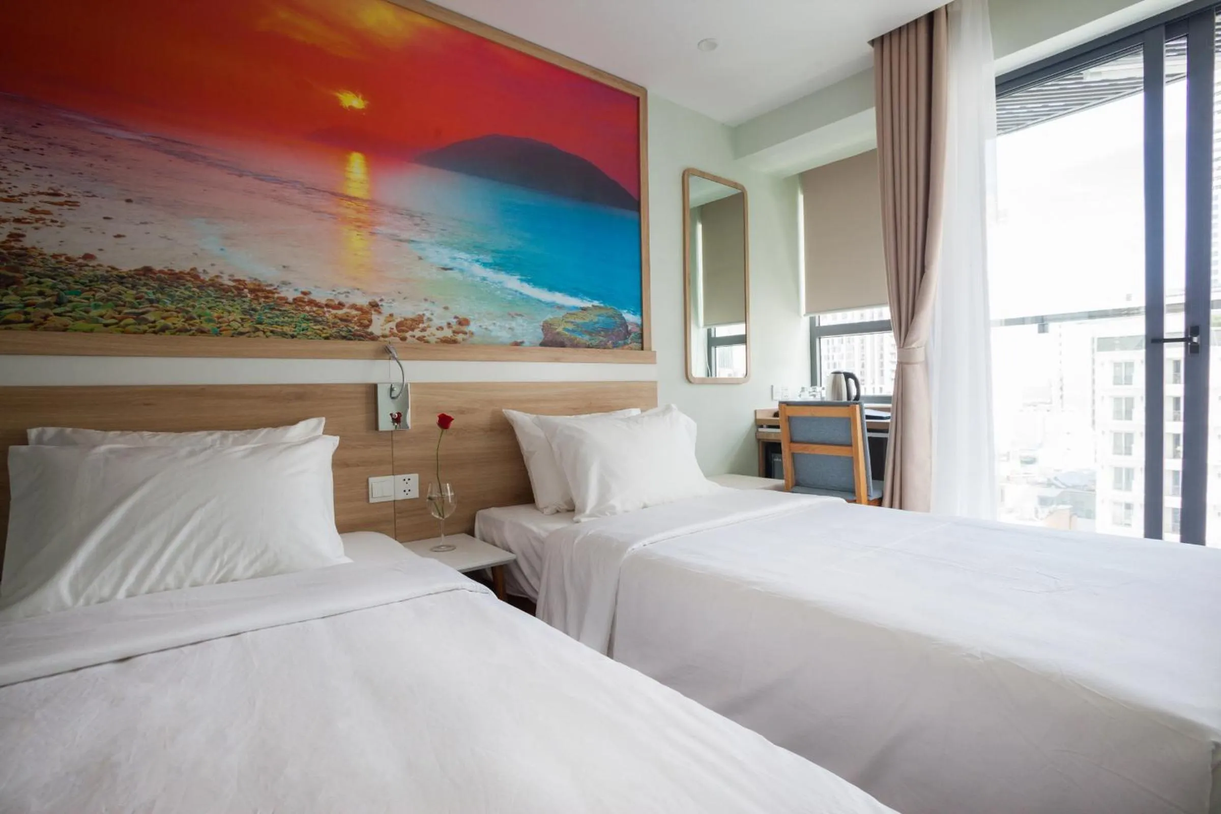 Bed in Royal HPM Hotel