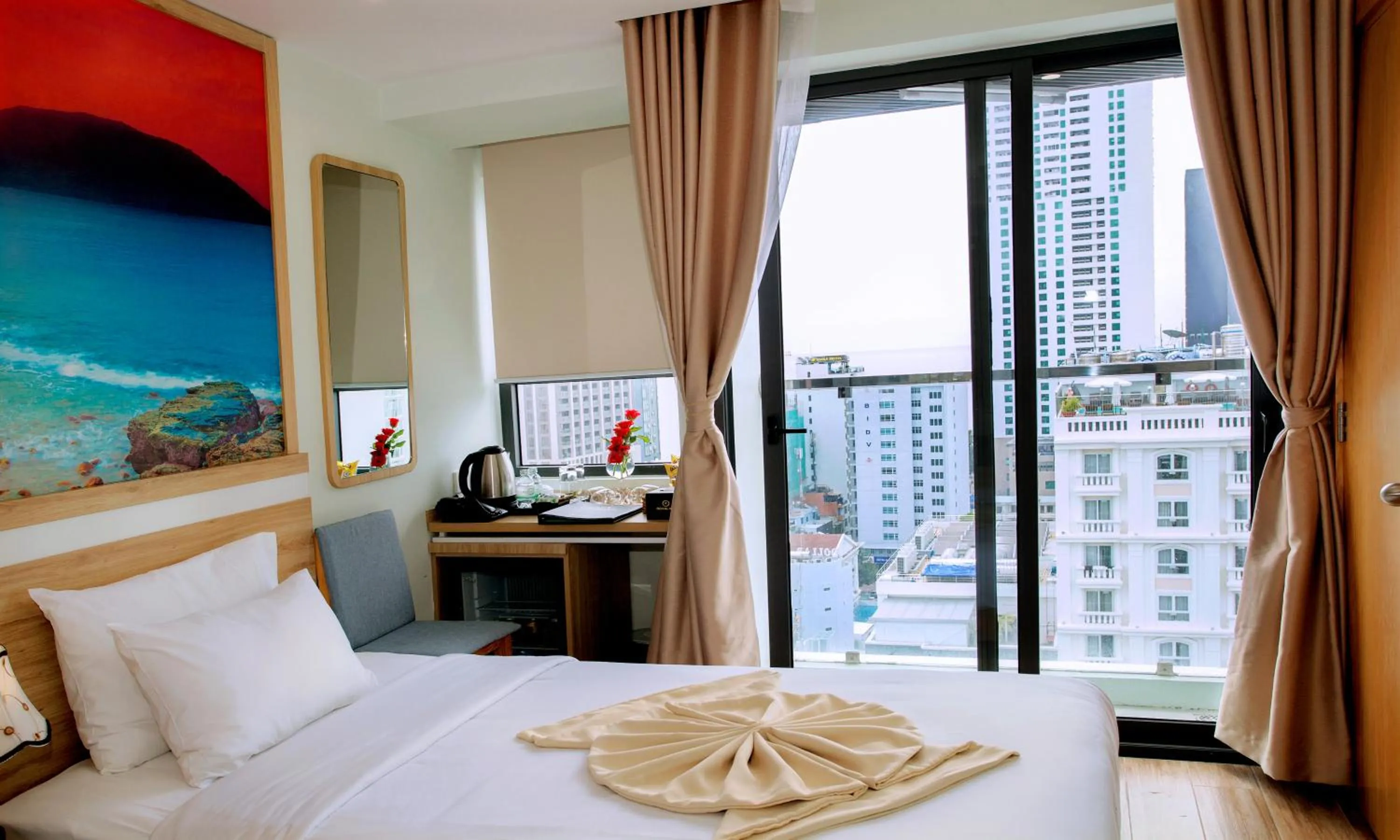 Bed in Royal HPM Hotel