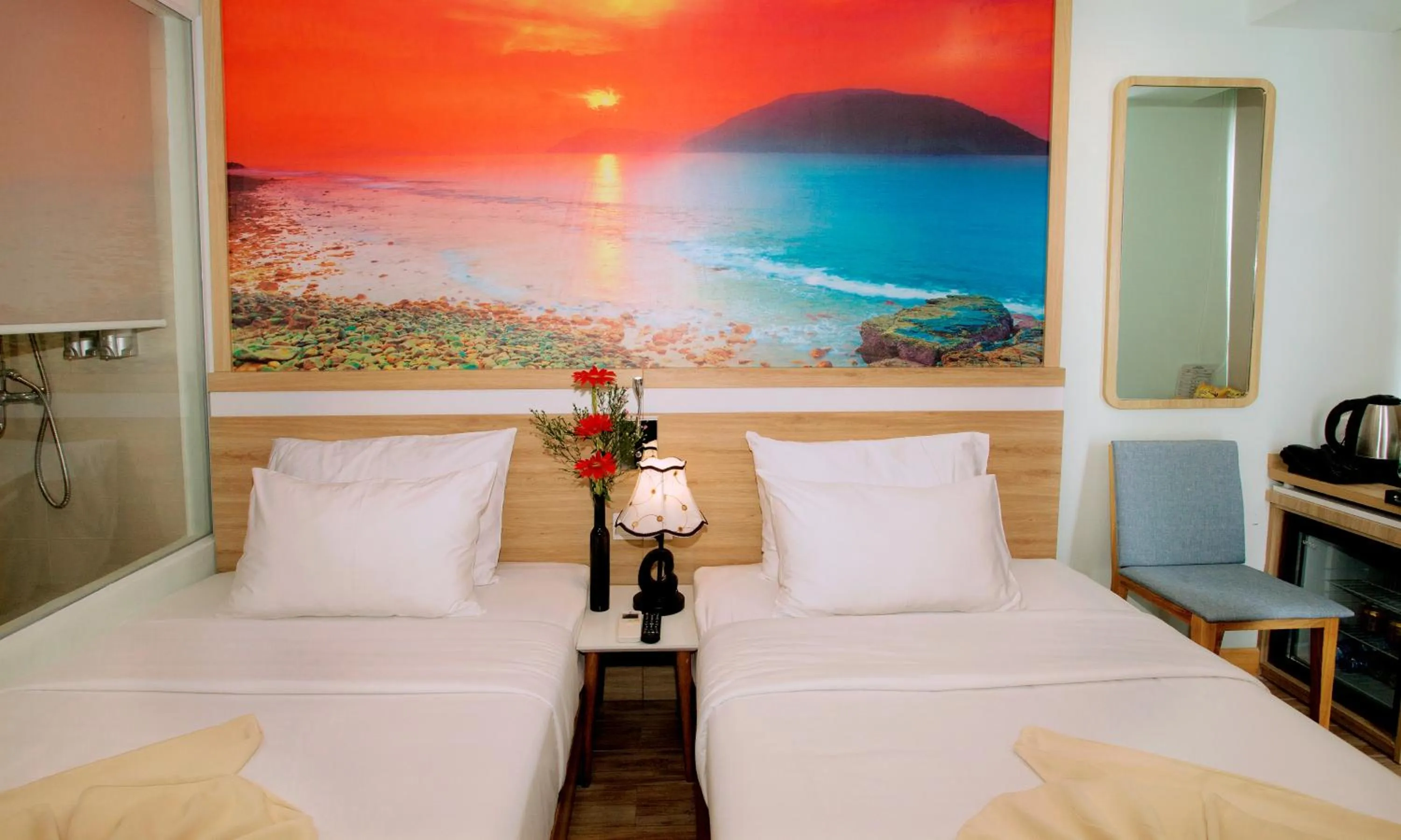 Bed in Royal HPM Hotel