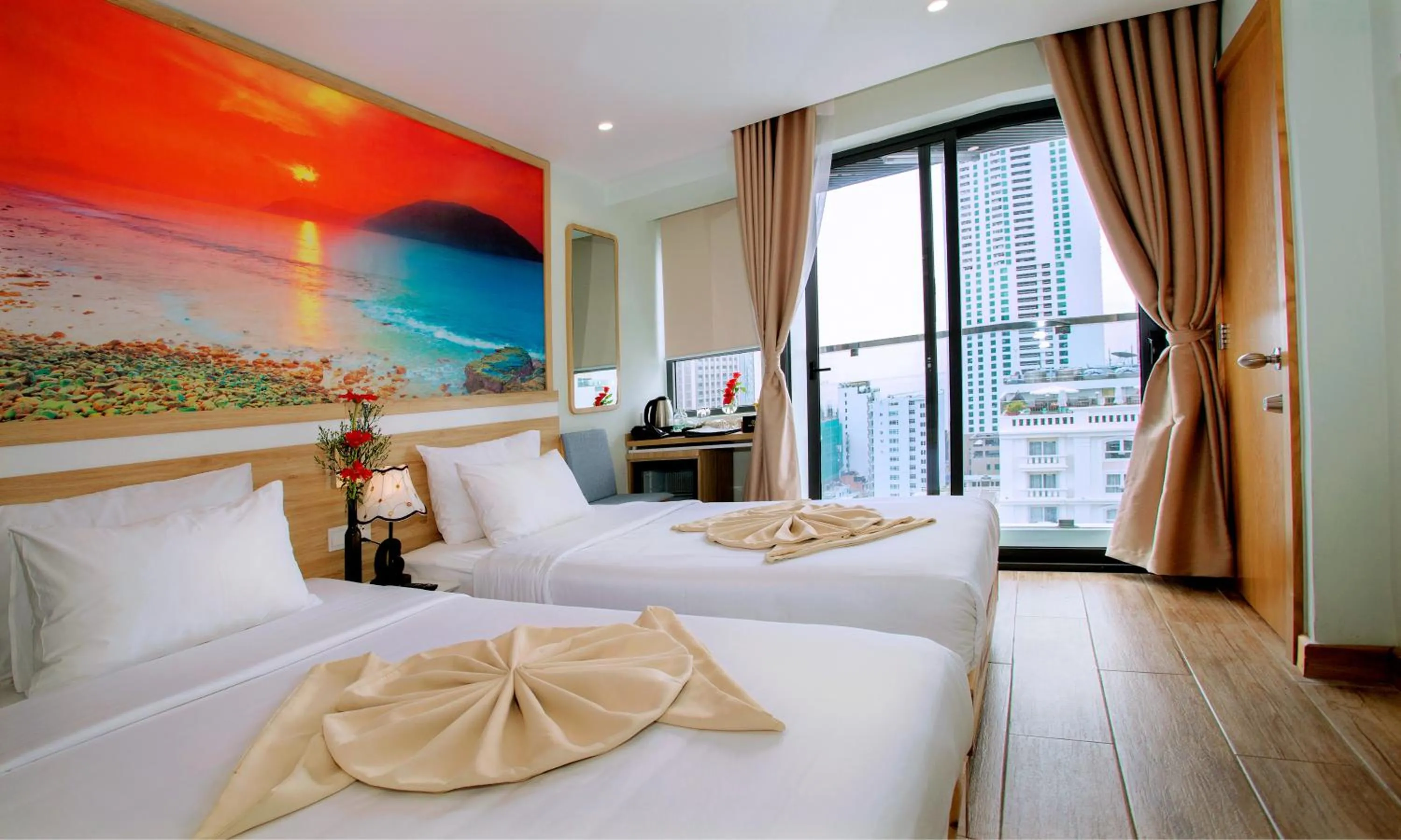 Bed in Royal HPM Hotel