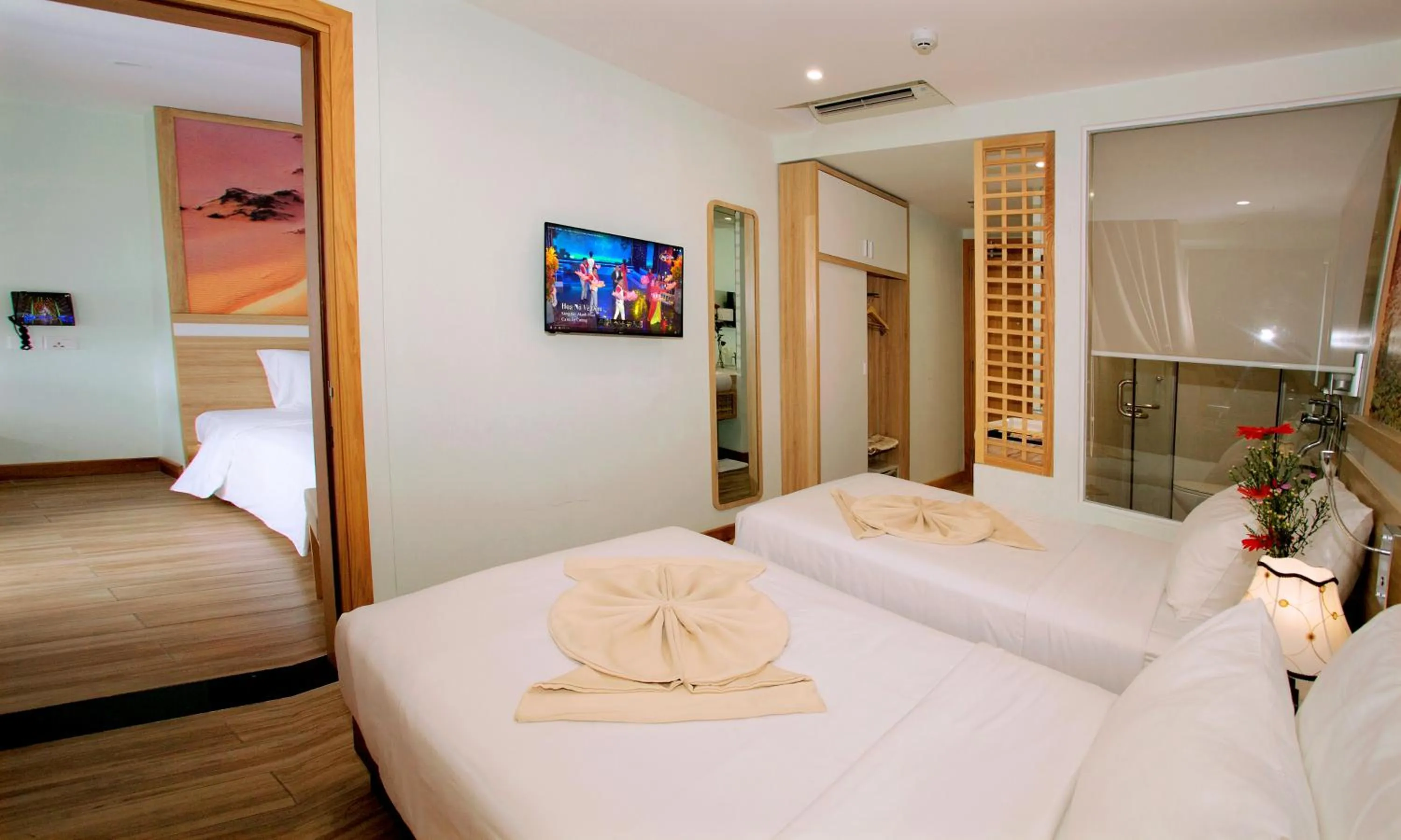 Bed in Royal HPM Hotel