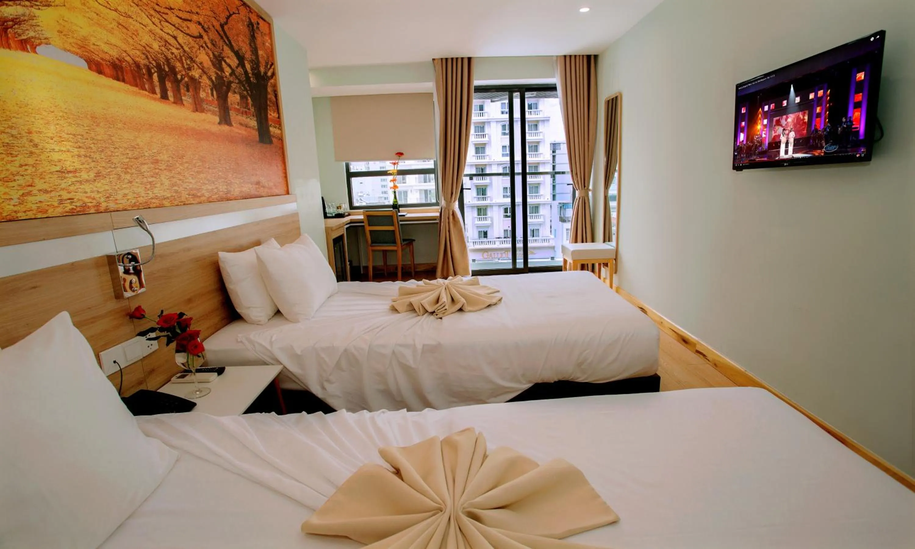 Bed in Royal HPM Hotel