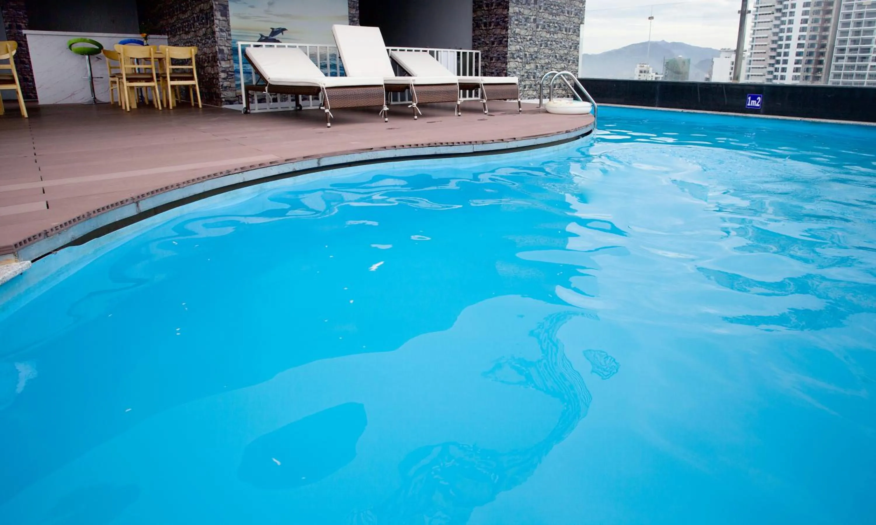 Swimming pool in Royal HPM Hotel