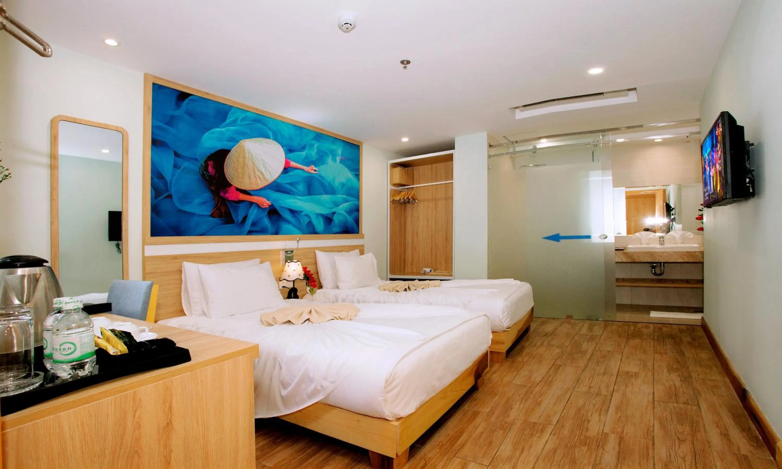 Bed in Royal HPM Hotel