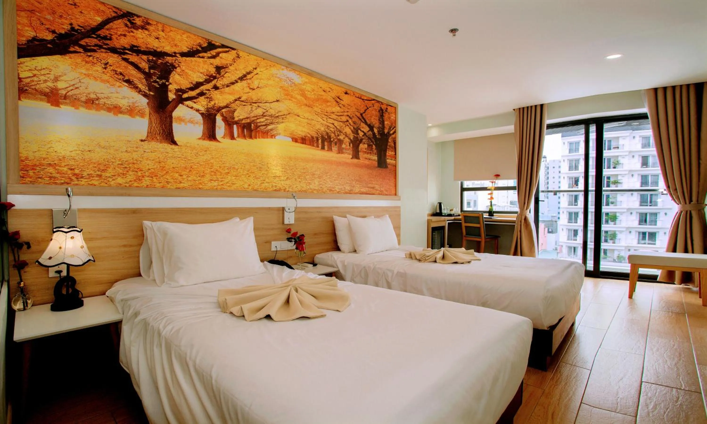 Bed in Royal HPM Hotel