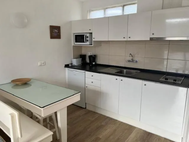 Kitchen or kitchenette in Sintra Sol - Apartamentos Turisticos