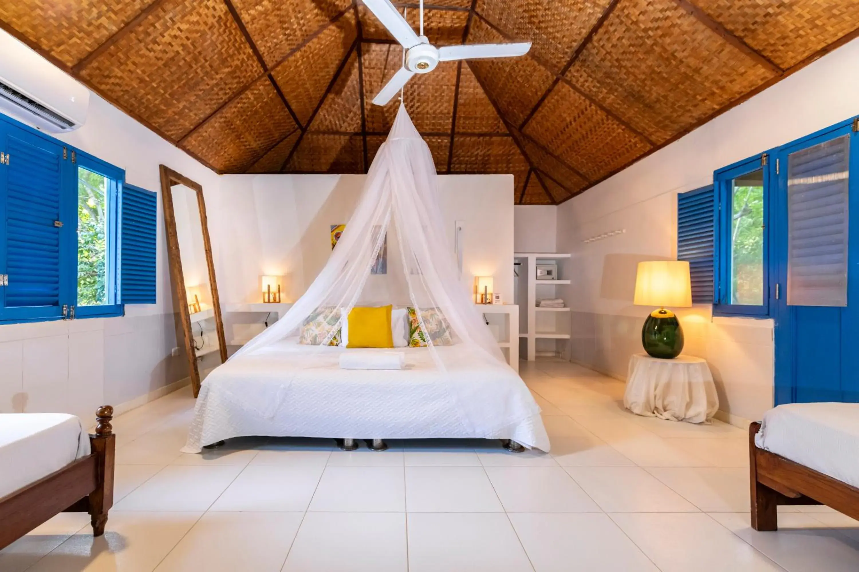 Quadruple Room with Garden View in Hotel Coralina Island Quadruple Room with Garden View in Hotel Coralina Island