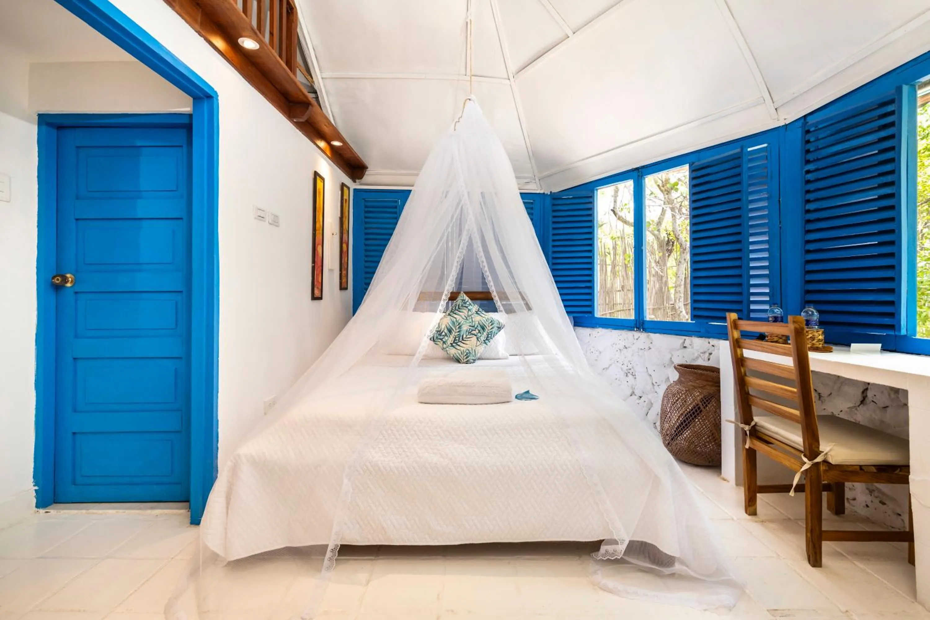 Bed in Hotel Coralina Island