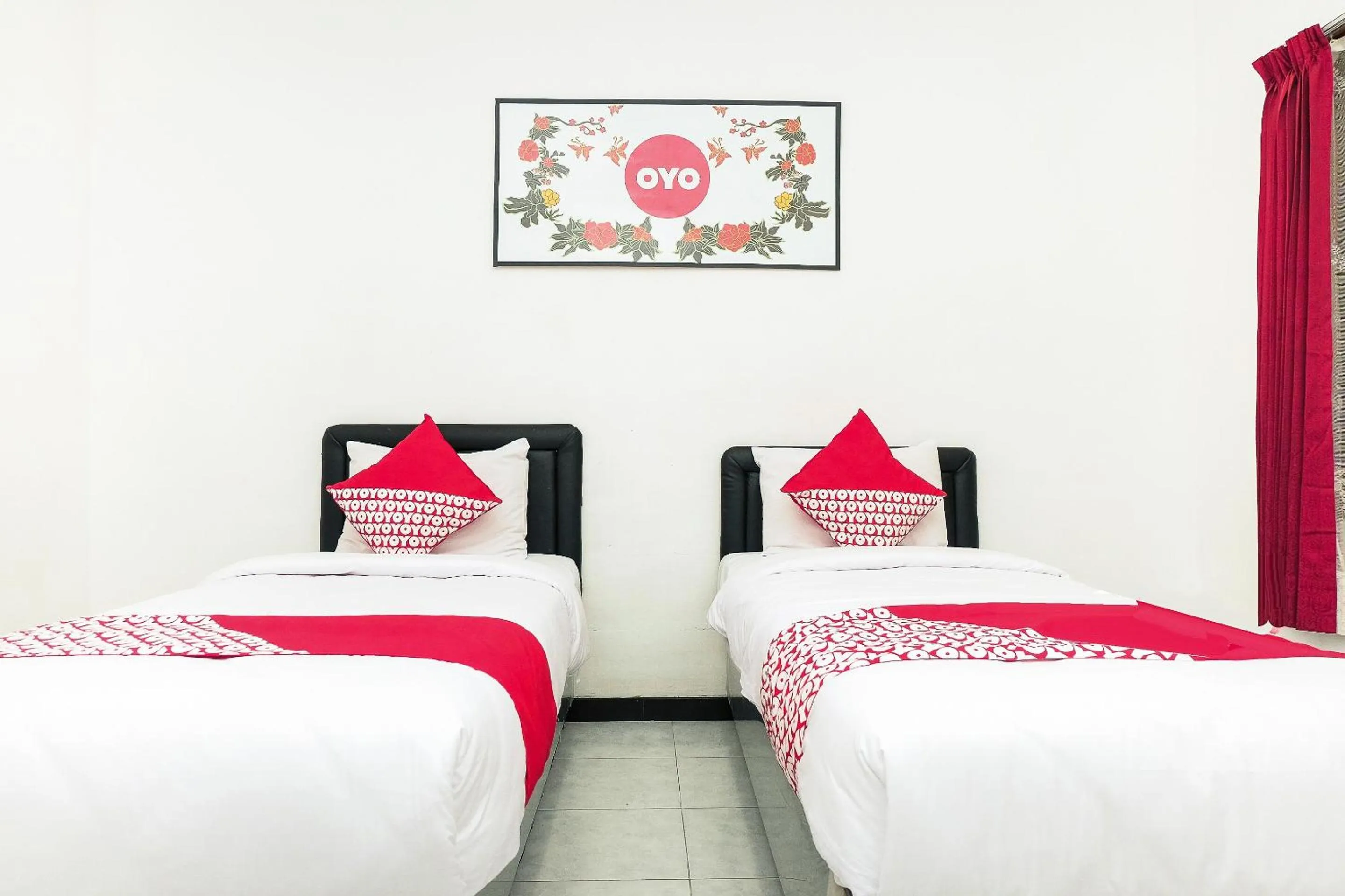 Bedroom in Hotel O Loesje Guest House Syariah