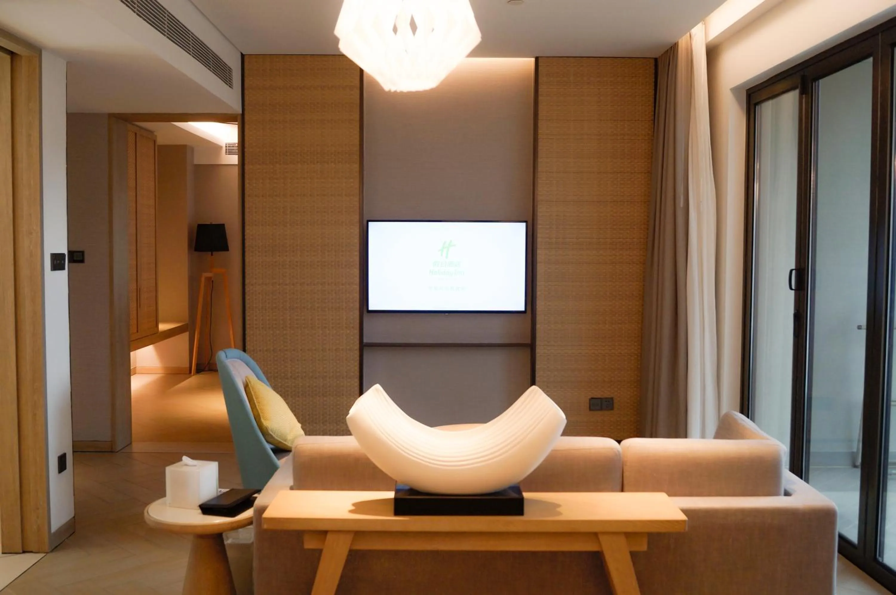 Seating area in Holiday Inn Resort Qionghai Guantang by IHG