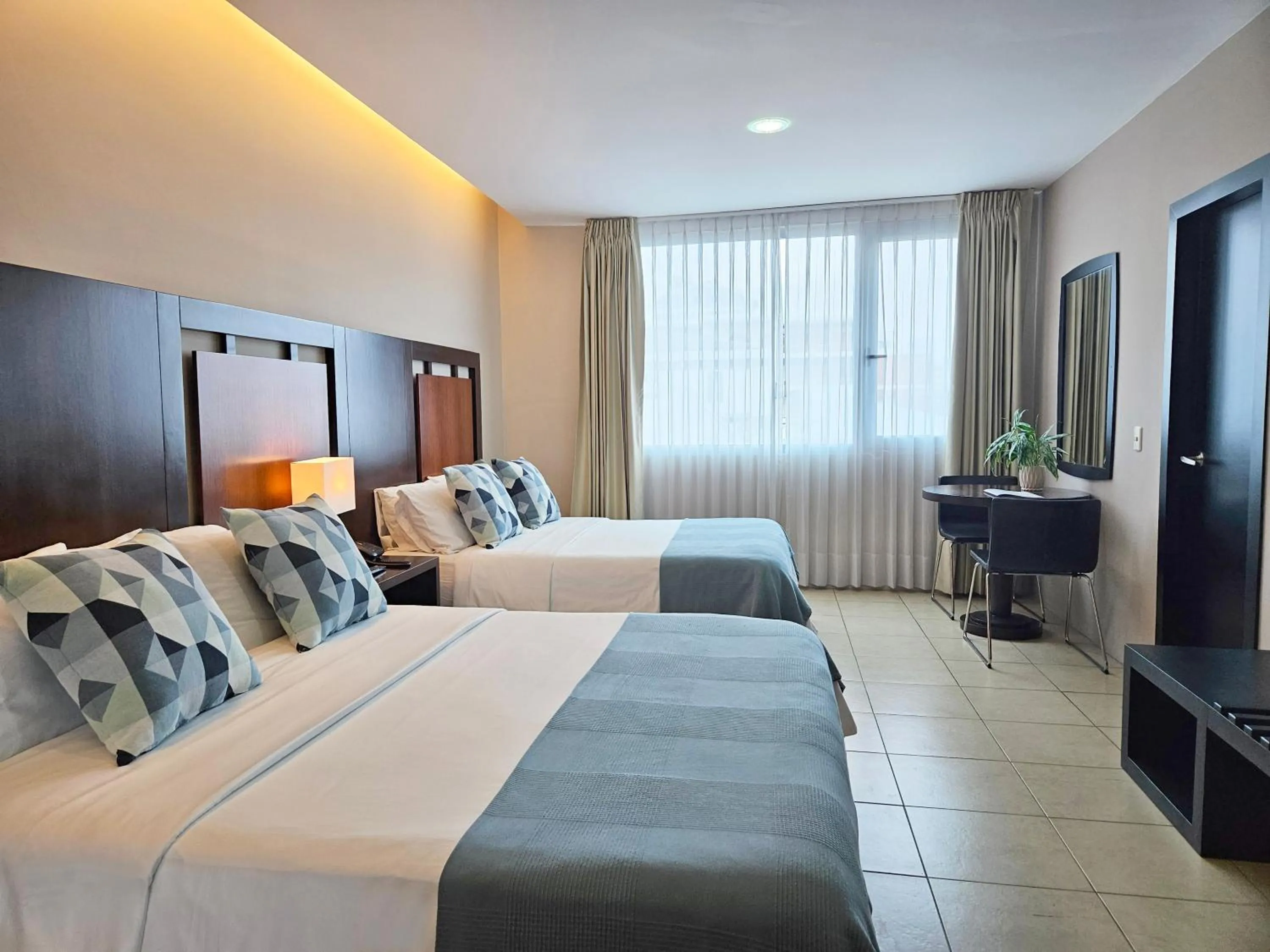 Bed in Hotel Perla Spondylus