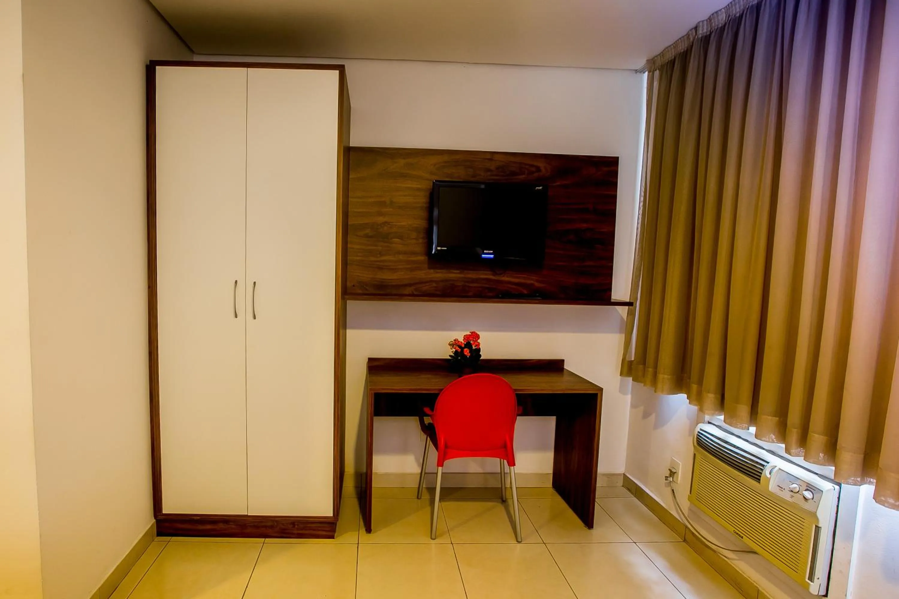 TV and multimedia in Hotel Flat Itaipava