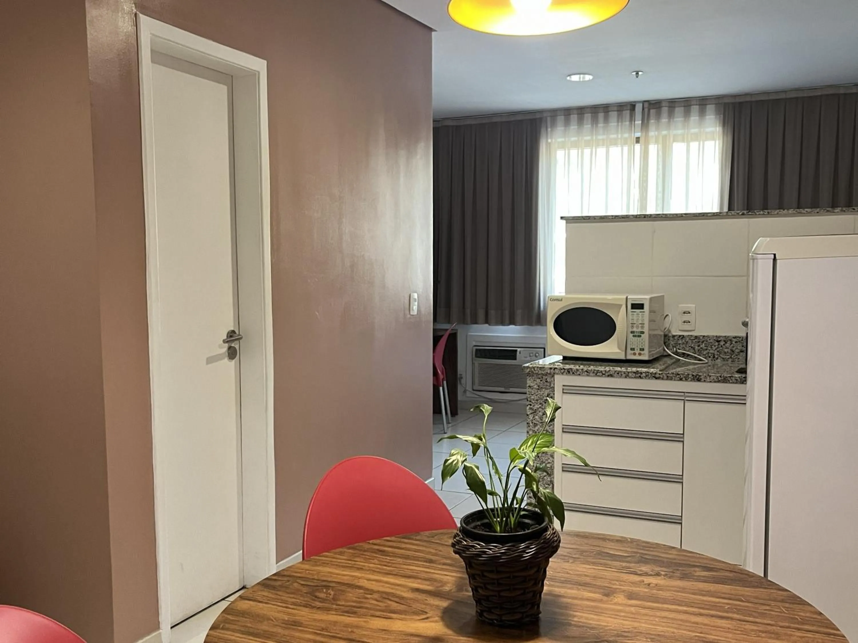 Kitchen or kitchenette in Hotel Flat Itaipava