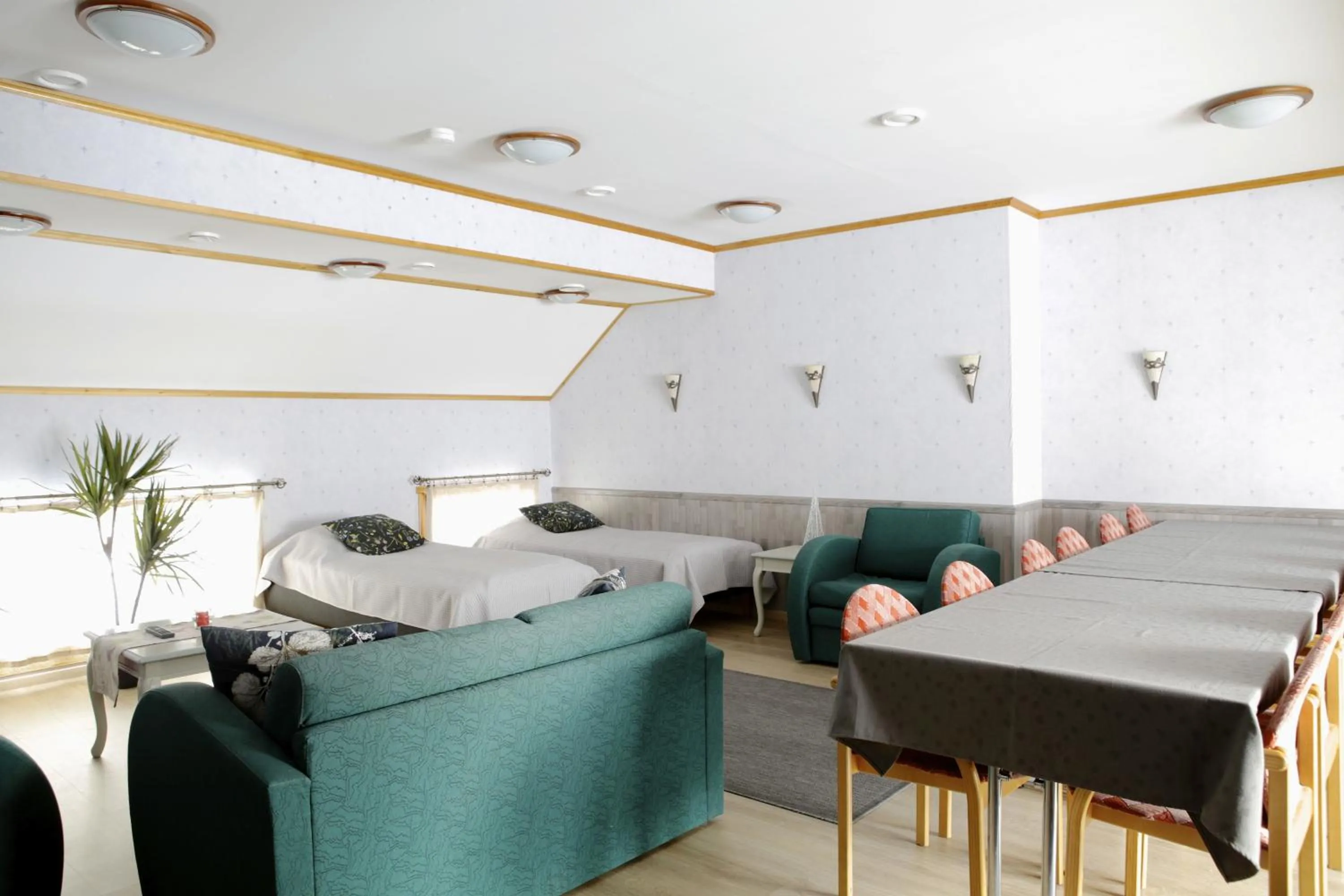 Photo of the whole room, Bed in Yli-Kaitala Holiday Resort Tuuliviiri