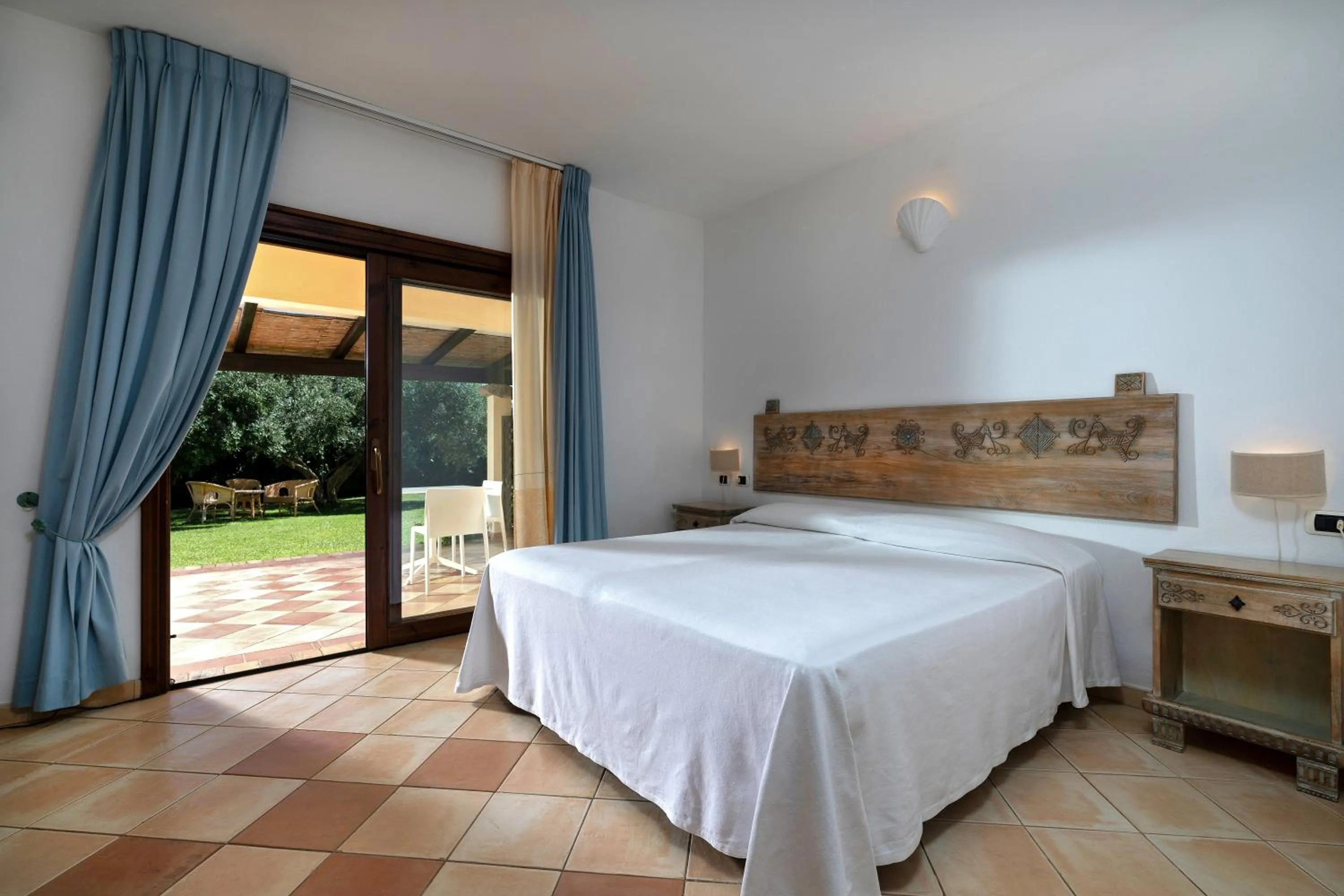 Photo of the whole room, Bed in Porto Giunco Residence