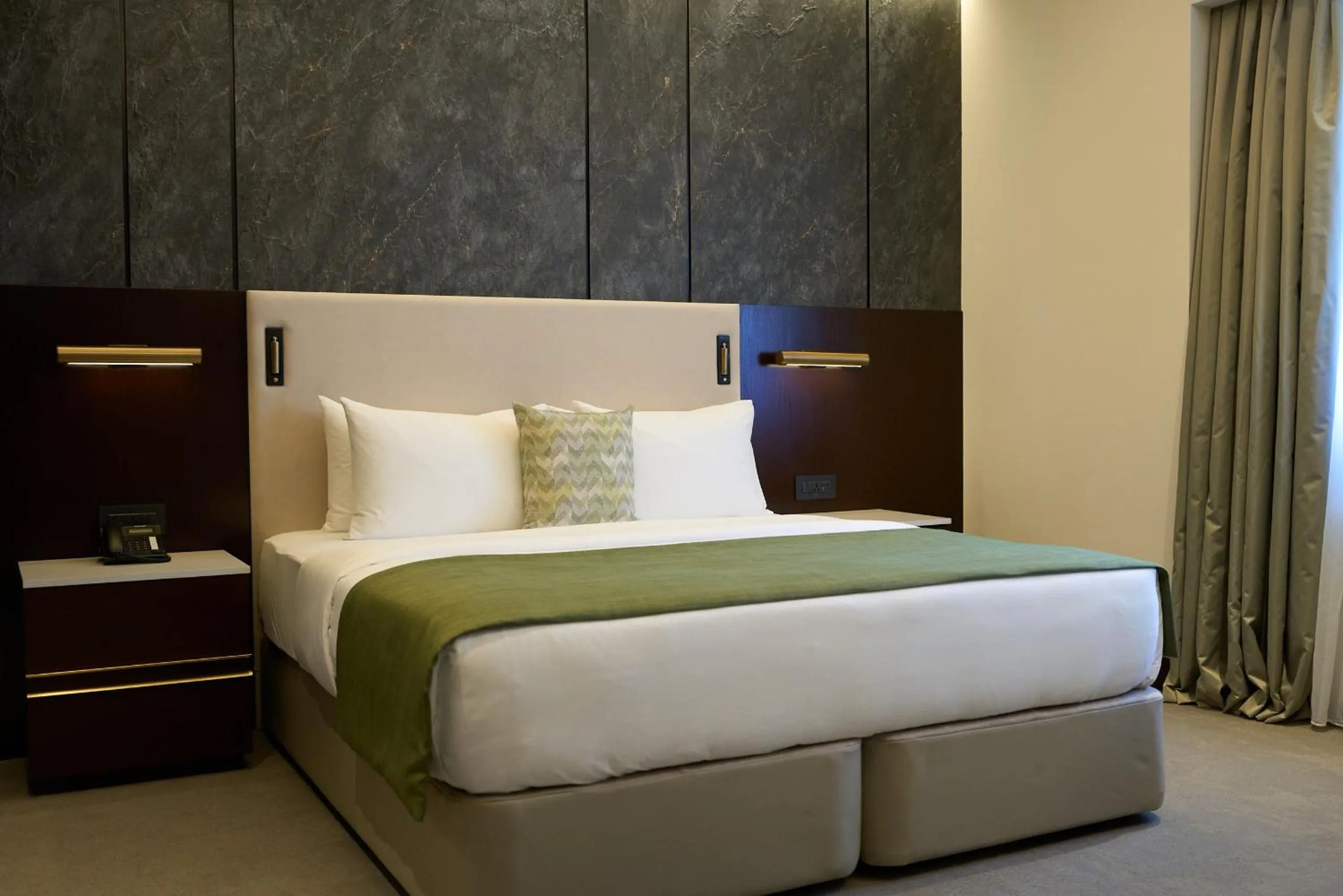 Bed in Qafqaz Riverside Hotel