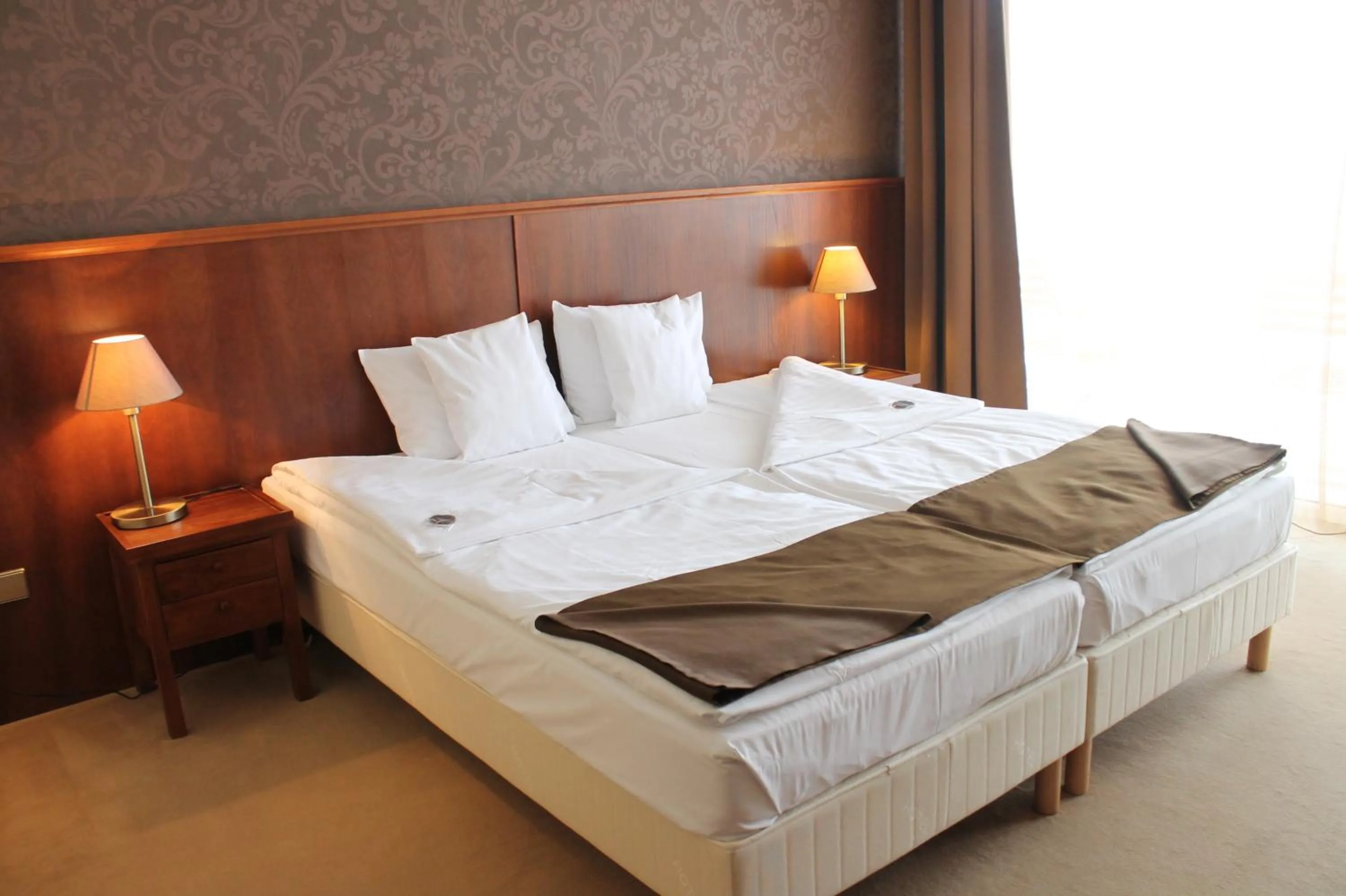 Bed in Szépia Bio and Art Hotel