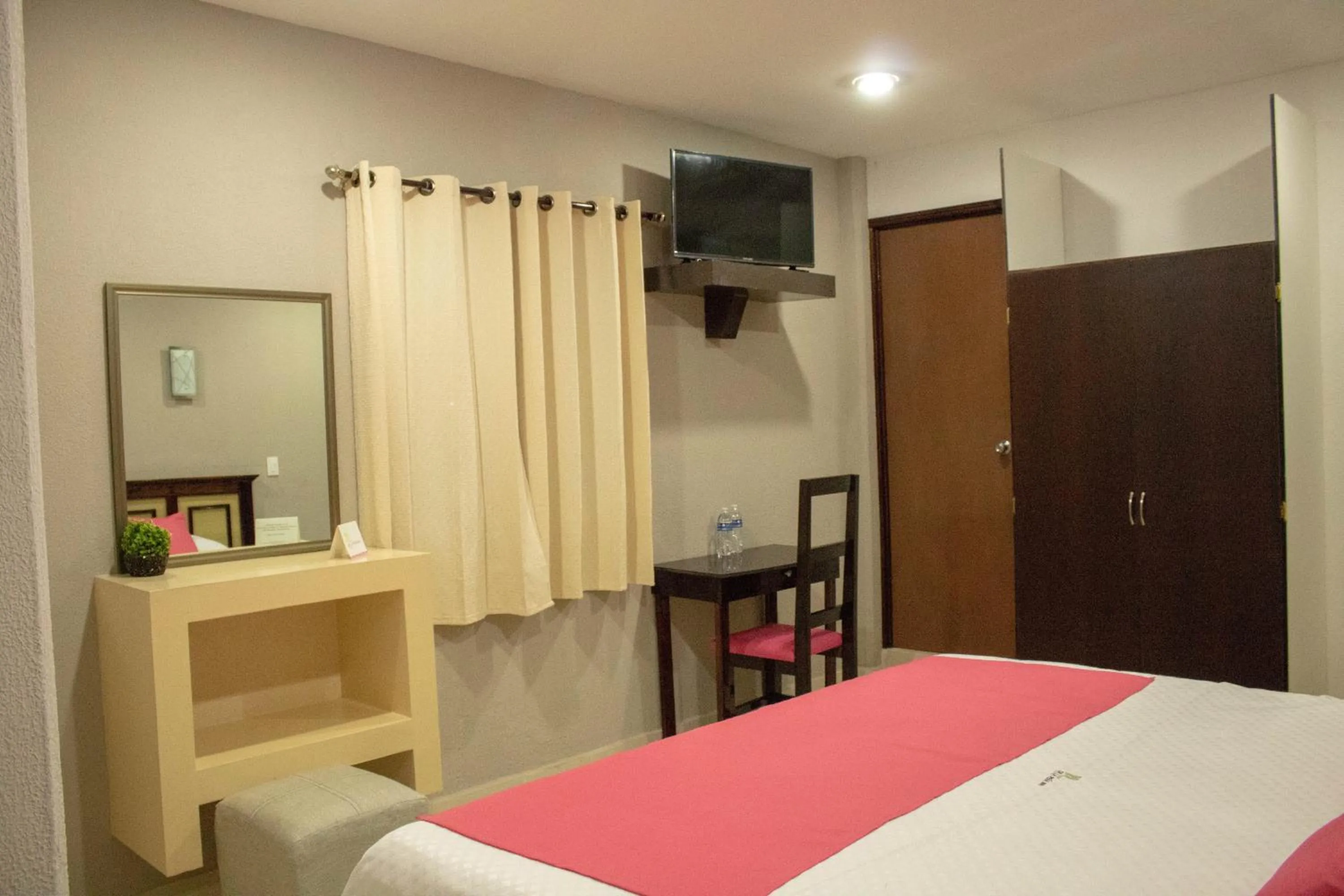 Bed in HOTEL DE LA PEÑA INN