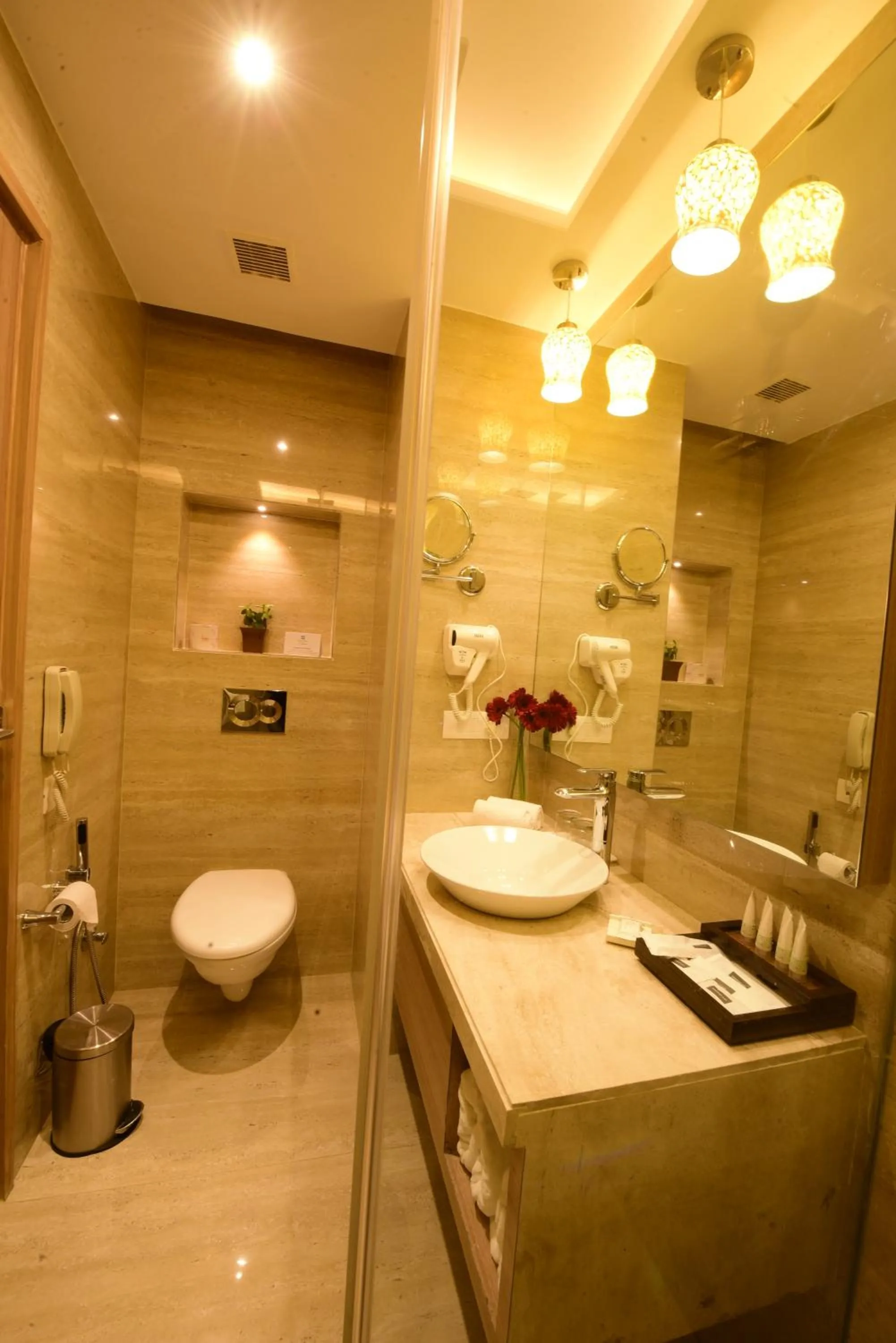 Toilet in SureStay Plus by Best Western Amritsar