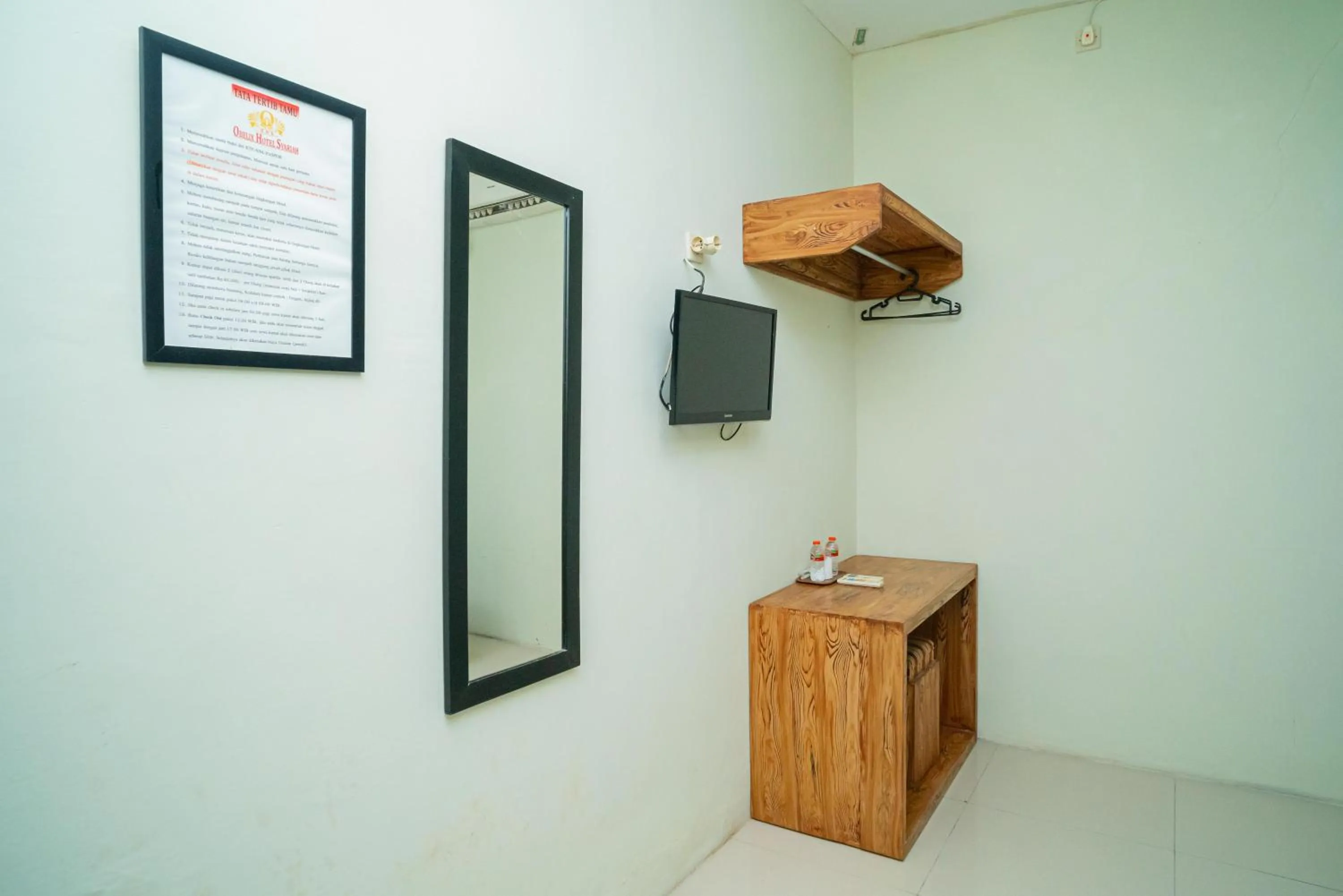 Bedroom in Sans Hotel Zam-Zam Syariah Palangkaraya