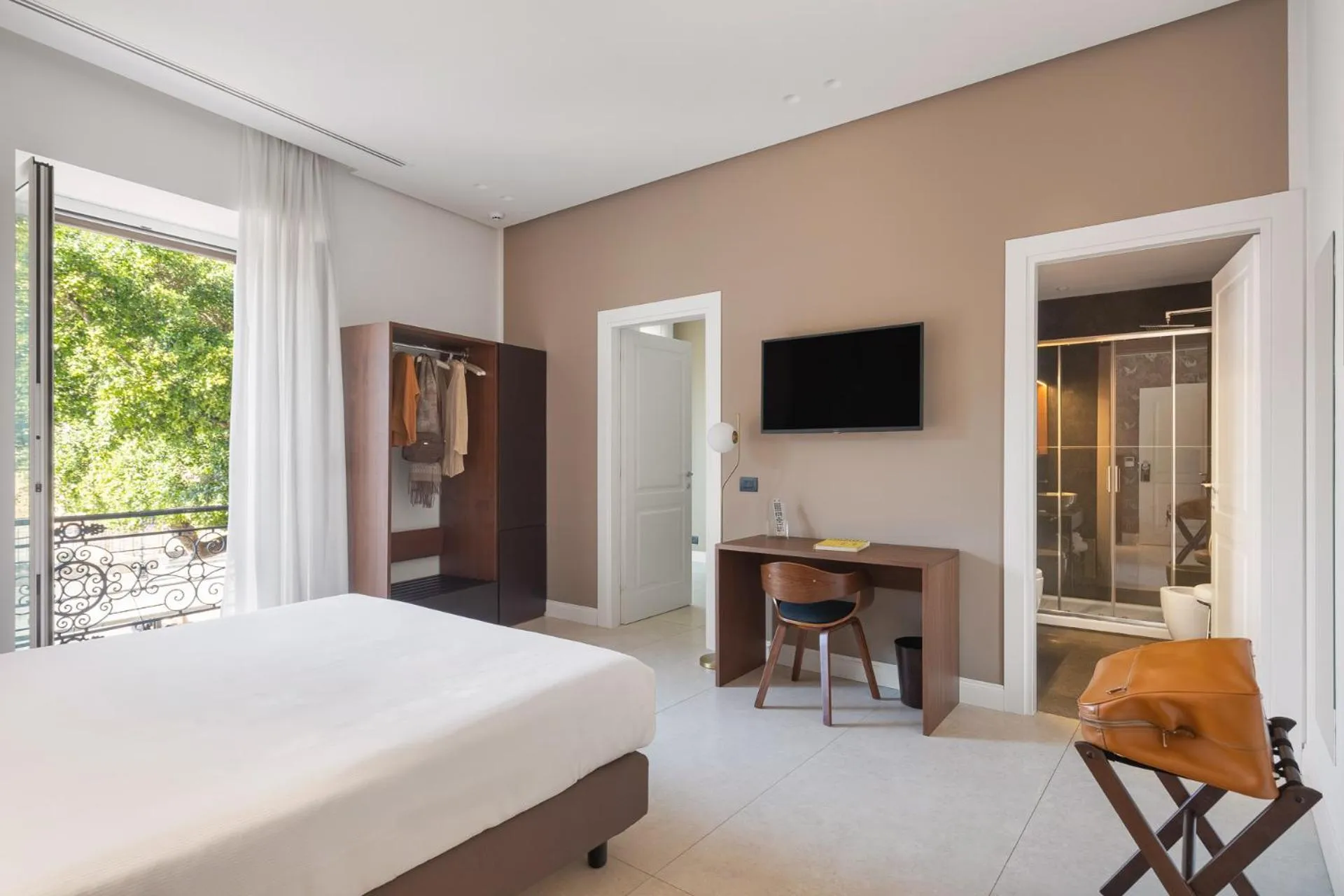 Bed in Palazzo Sovrana Serviced Luxury Apartments
