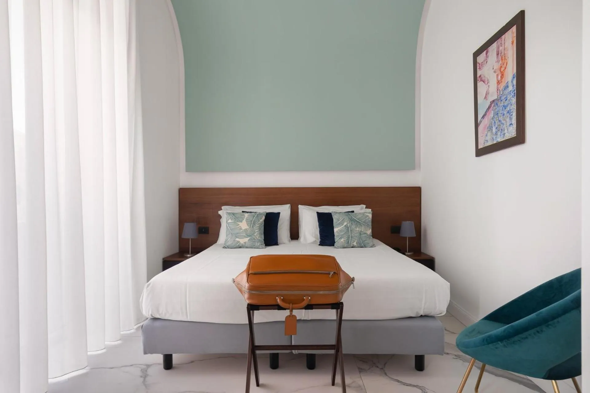 Bed in Palazzo Sovrana Serviced Luxury Apartments