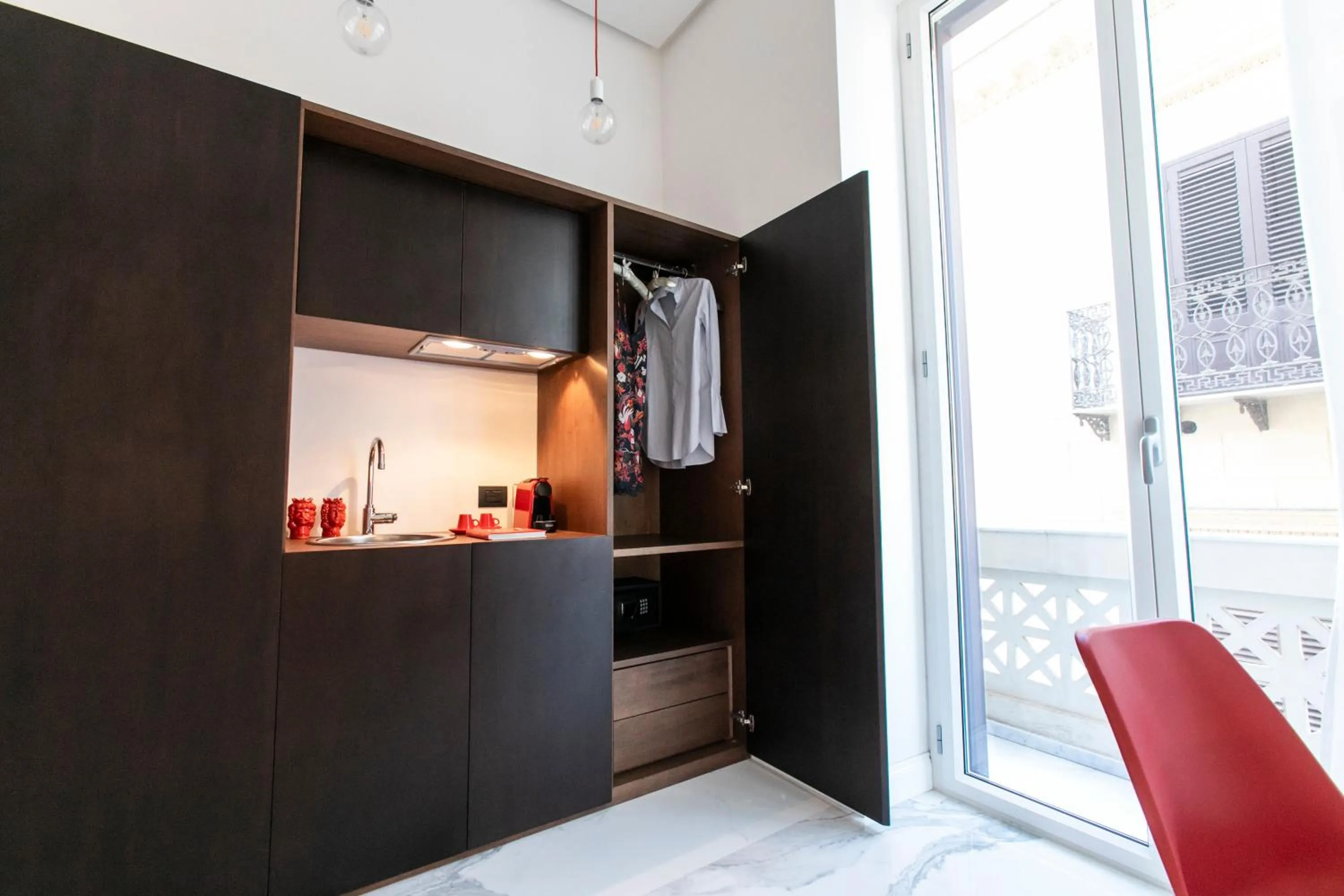wardrobe in Palazzo Sovrana Serviced Luxury Apartments