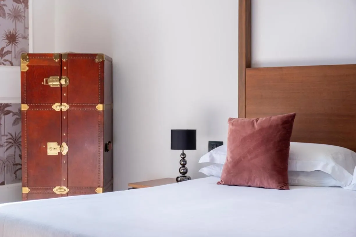 Bed in Palazzo Sovrana Serviced Luxury Apartments