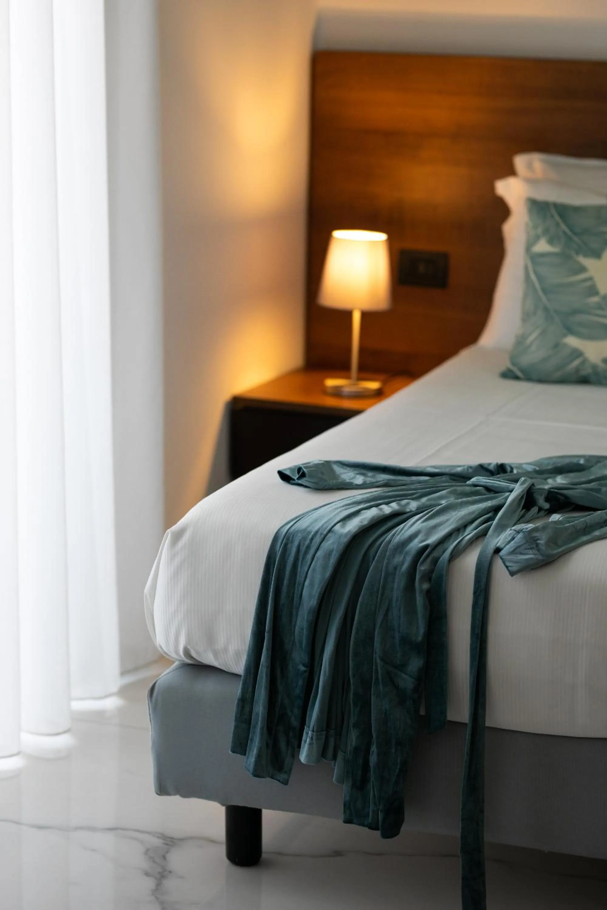 Bed in Palazzo Sovrana Serviced Luxury Apartments