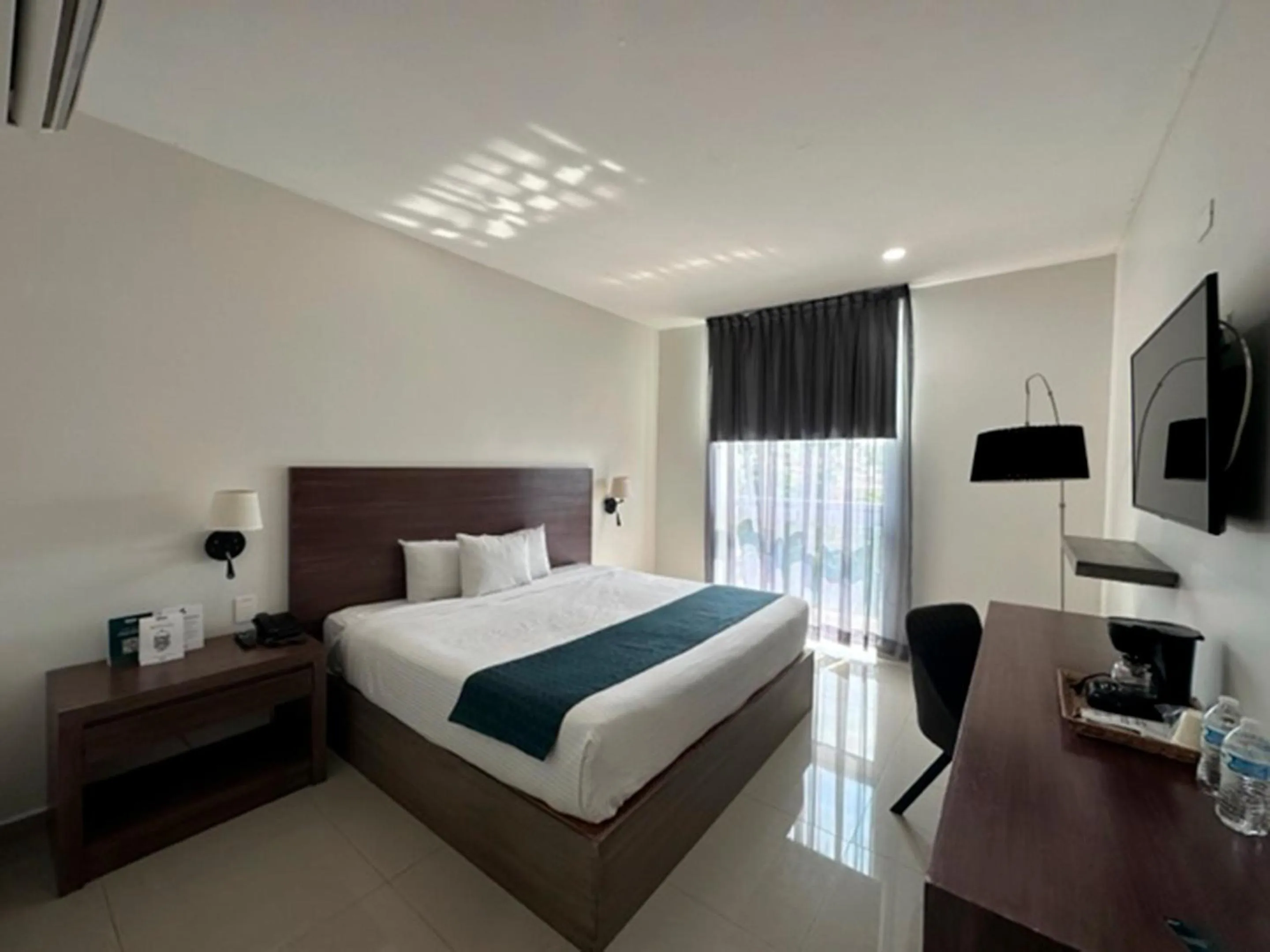 Bed in InHouse Hotel Culiacán