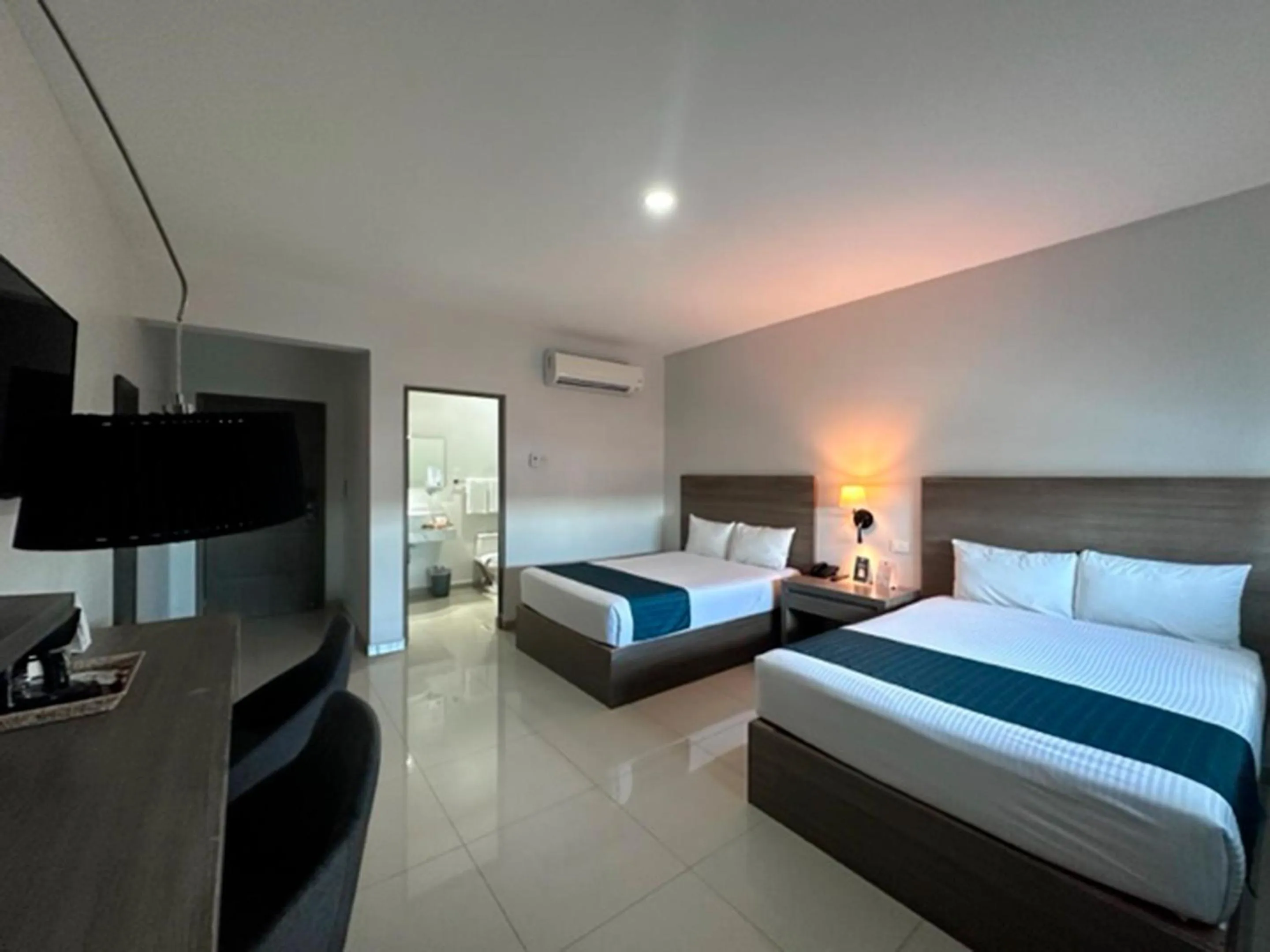 Bed in InHouse Hotel Culiacán