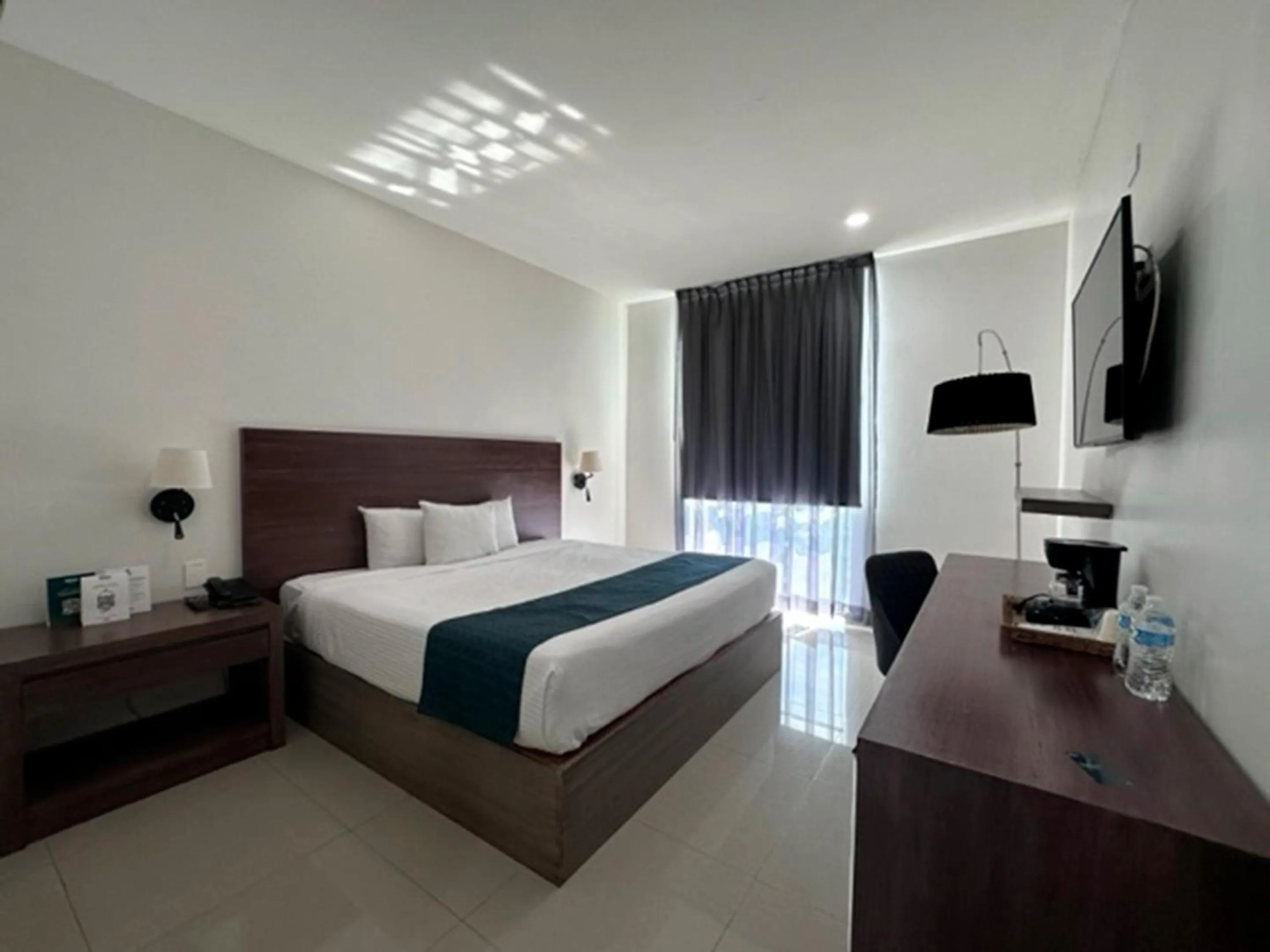 Bed in InHouse Hotel Culiacán