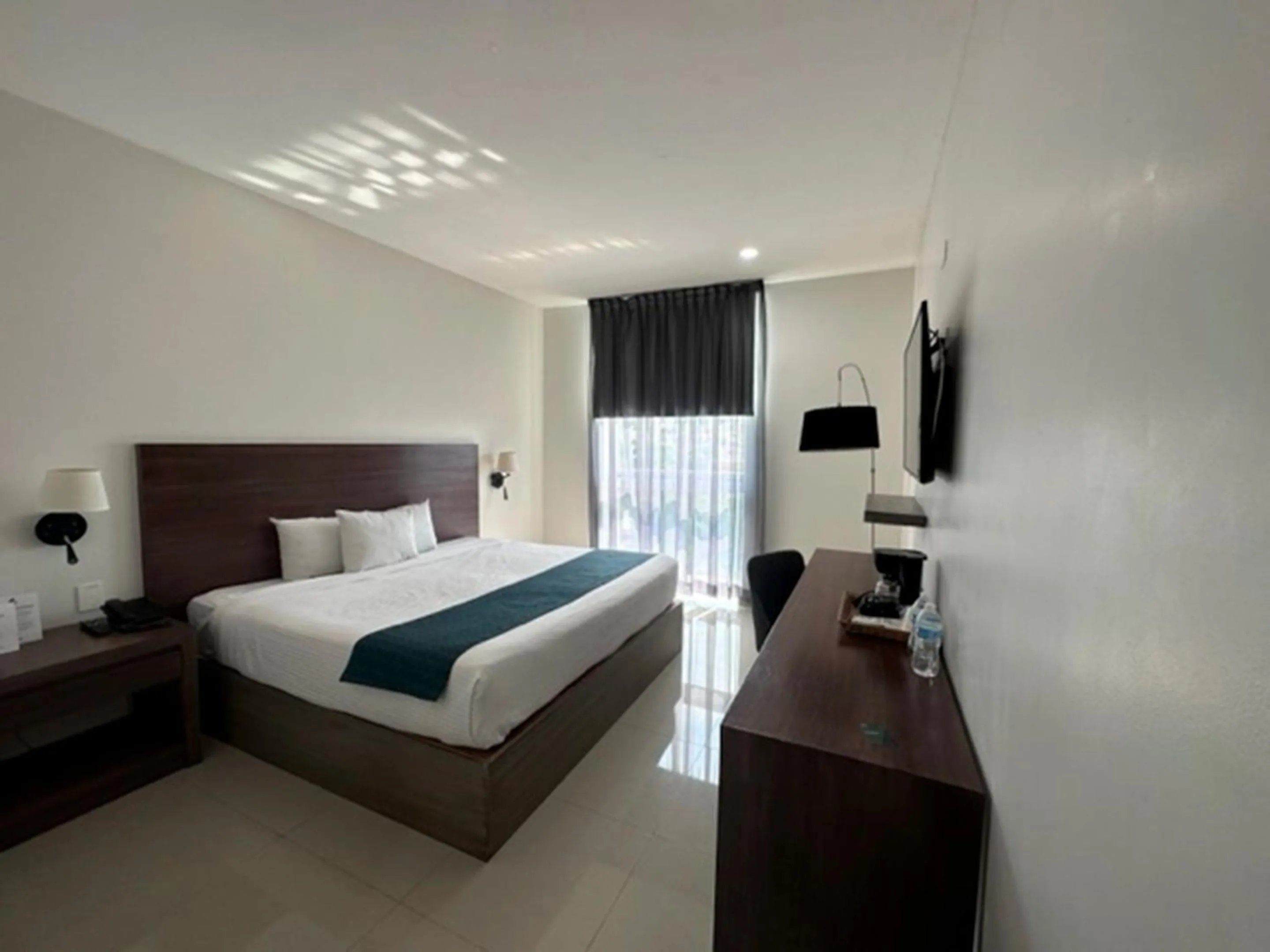 Bed in InHouse Hotel Culiacán