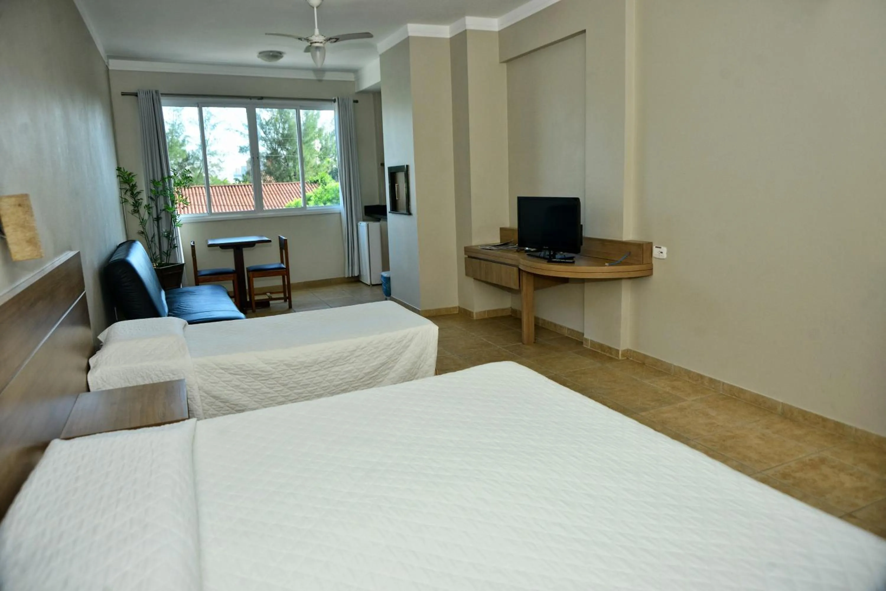 Bed in De Rose Praia Hotel