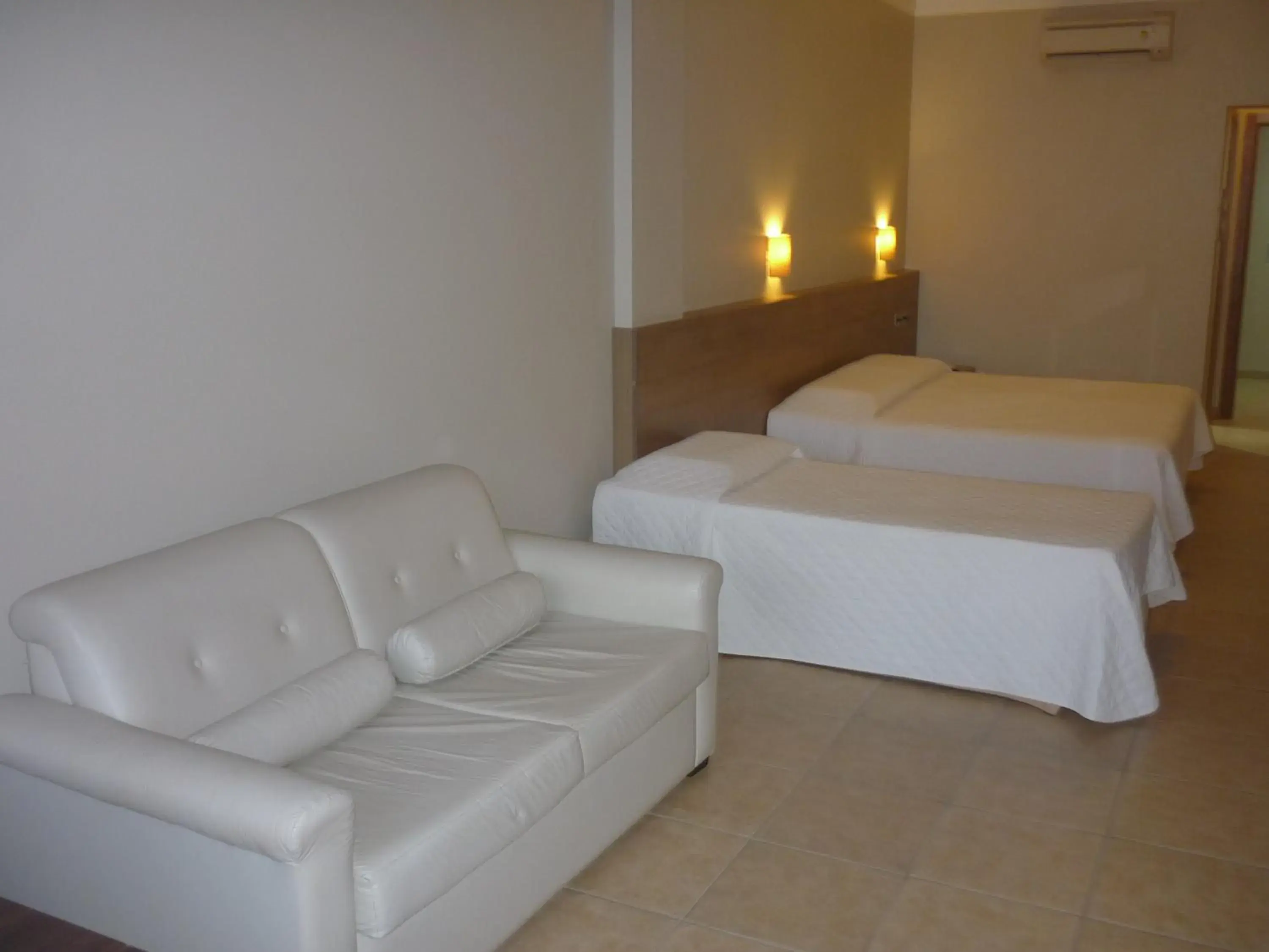 Family Room with Side Sea View in De Rose Praia Hotel Family Room with Side Sea View in De Rose Praia Hotel