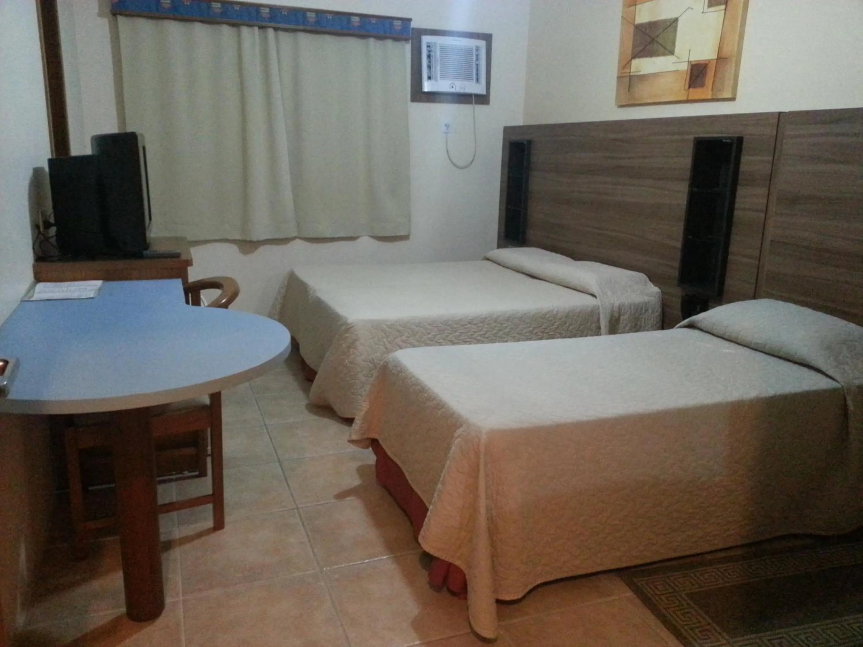 Bed in De Rose Praia Hotel