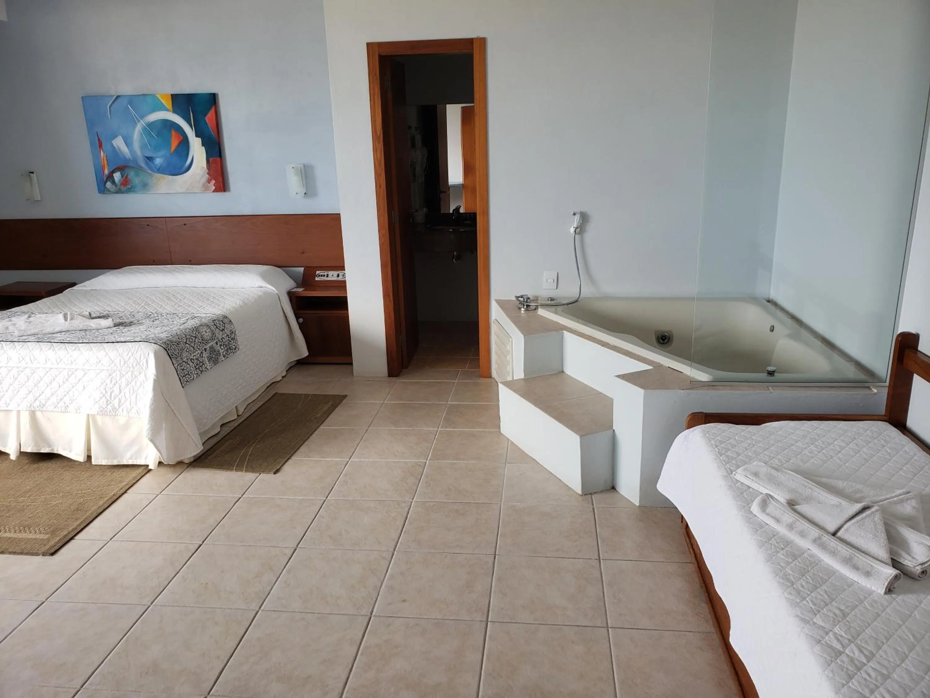 Bed in De Rose Praia Hotel