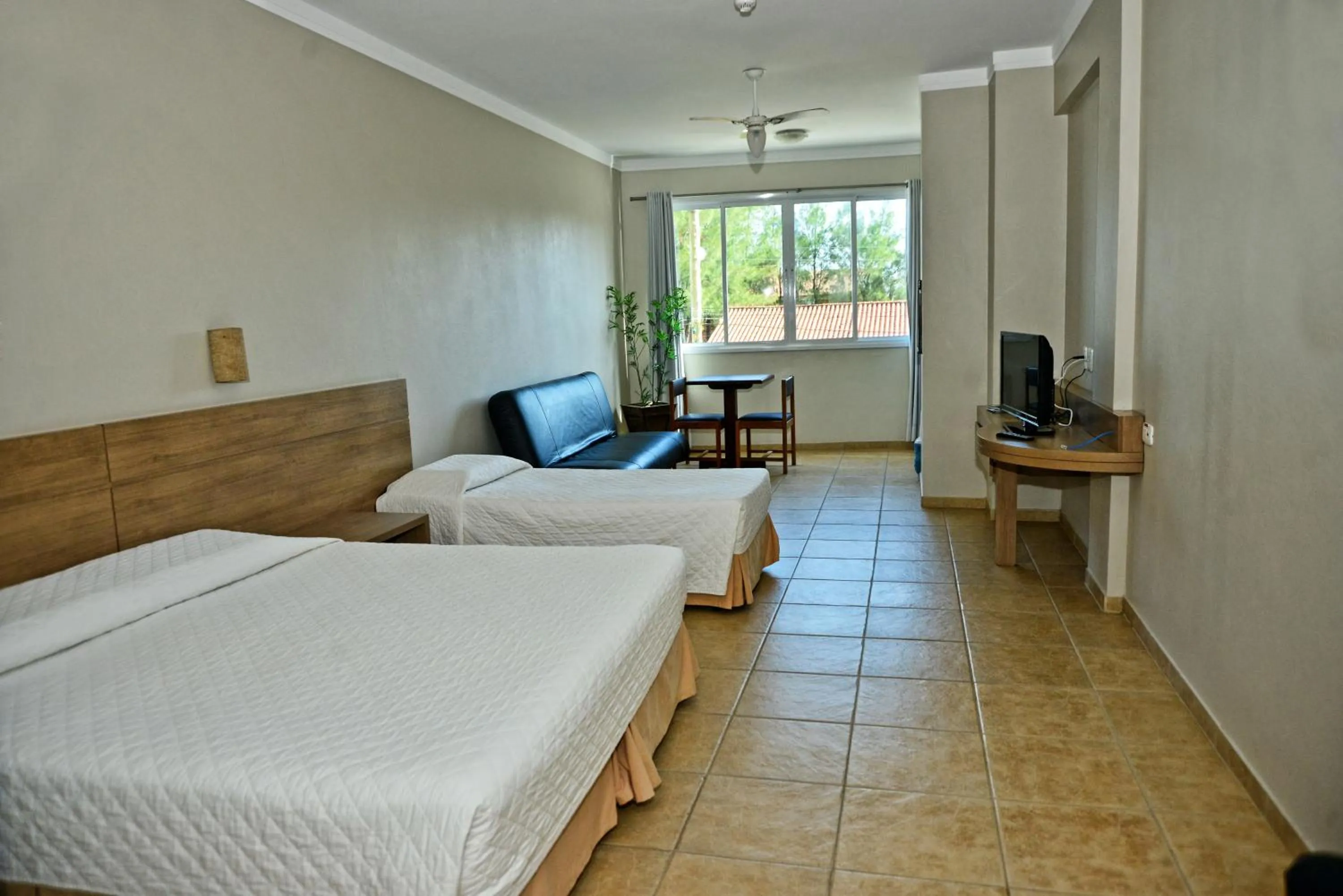 Bed in De Rose Praia Hotel