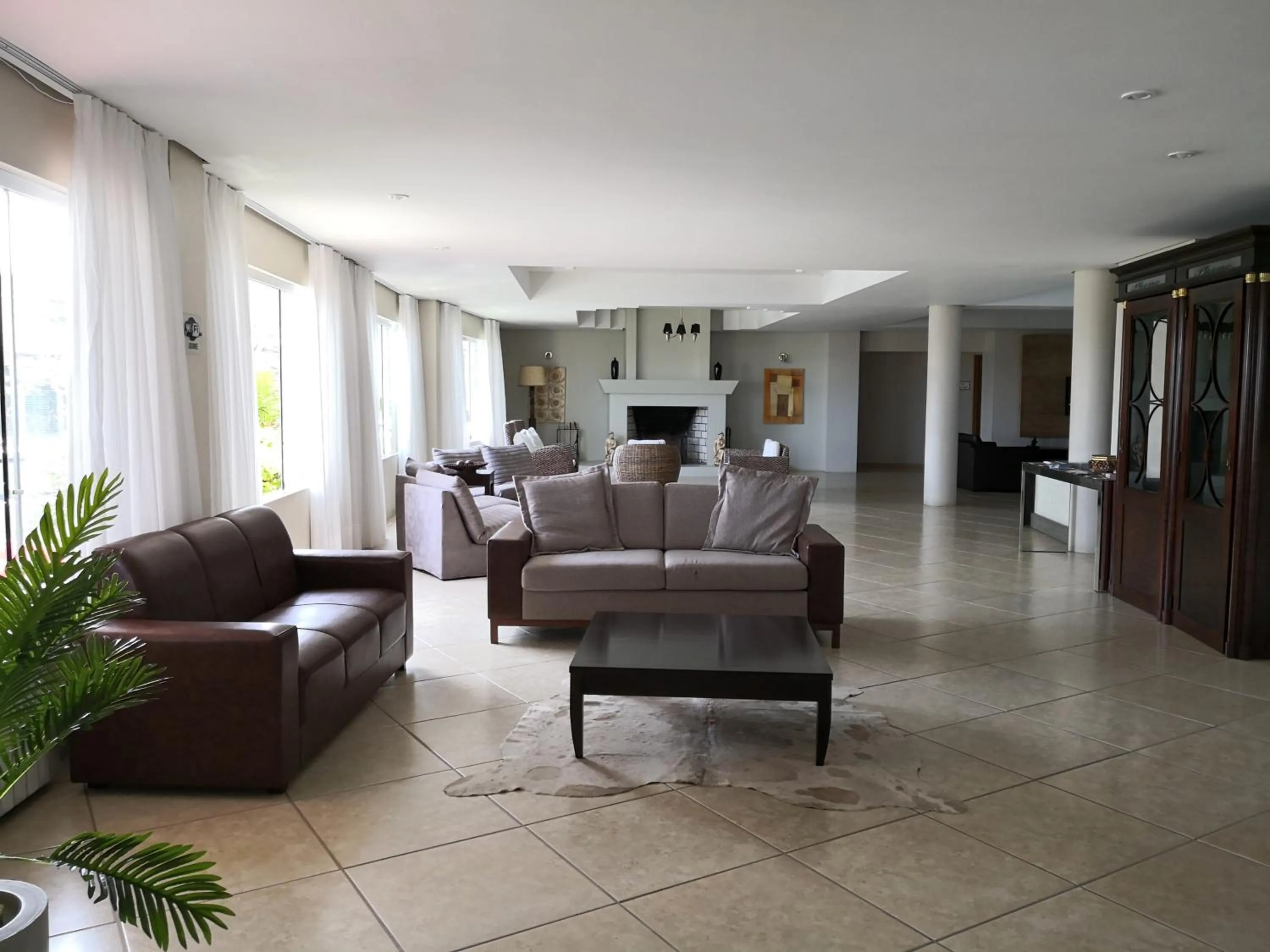 Living room in De Rose Praia Hotel