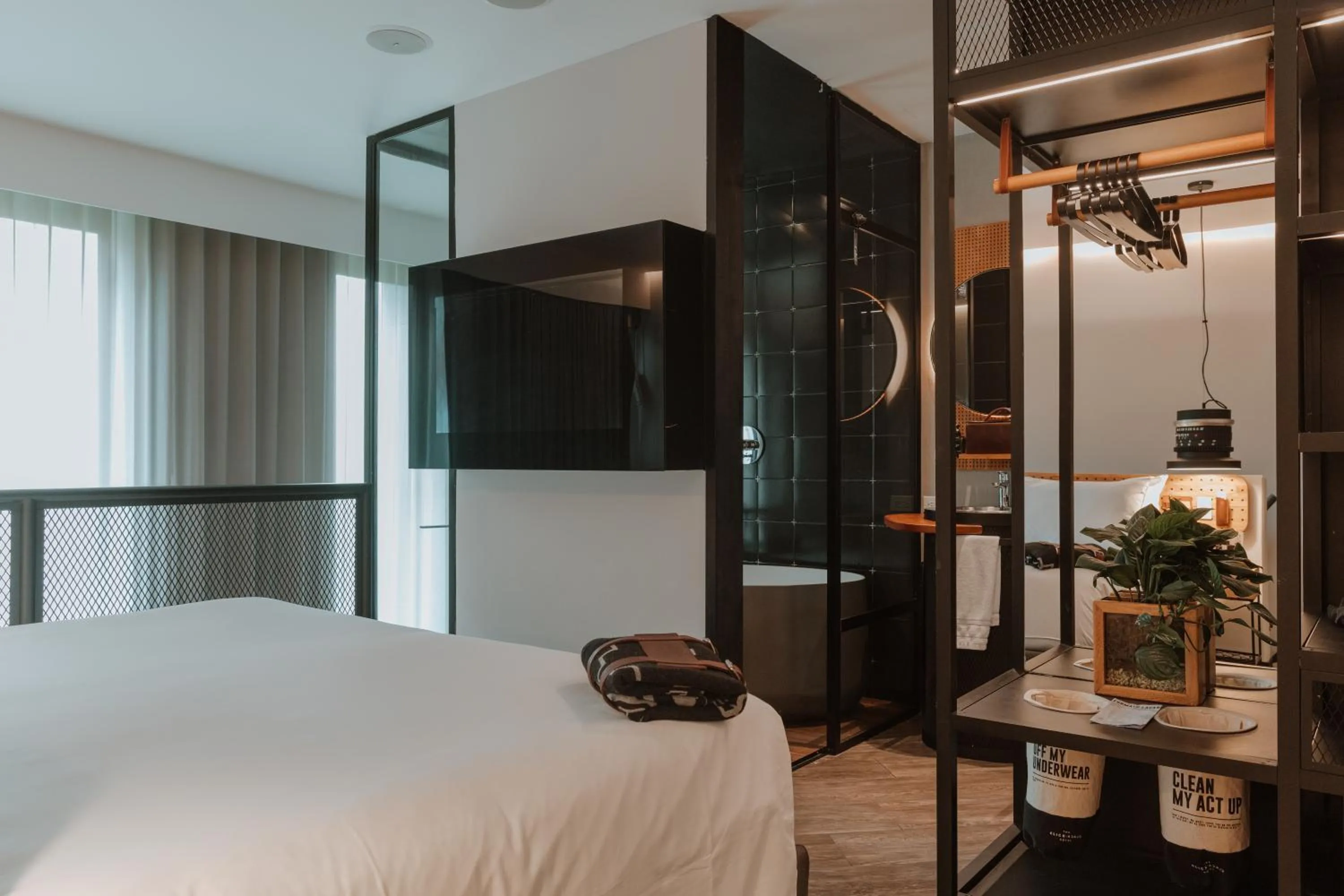 Bathroom, Bed in The Click Clack Hotel Medellín