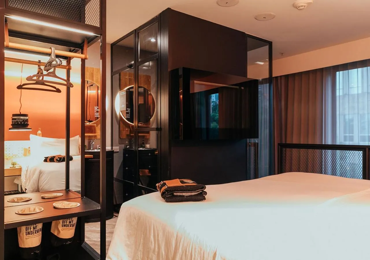 Bathroom, Bed in The Click Clack Hotel Medellín