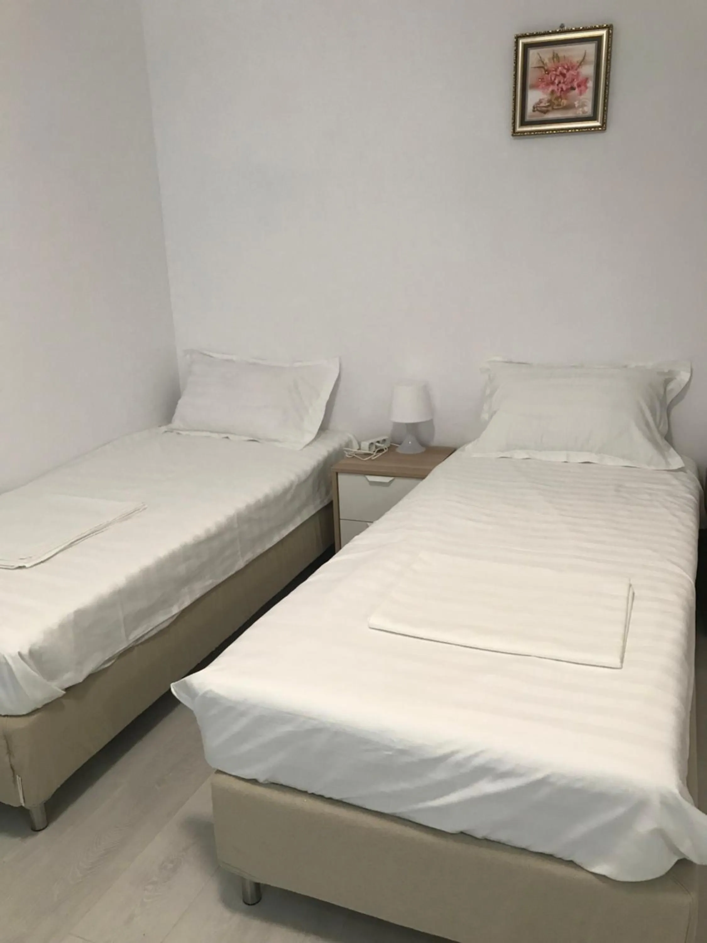 Bed in 21 Residence Apartments