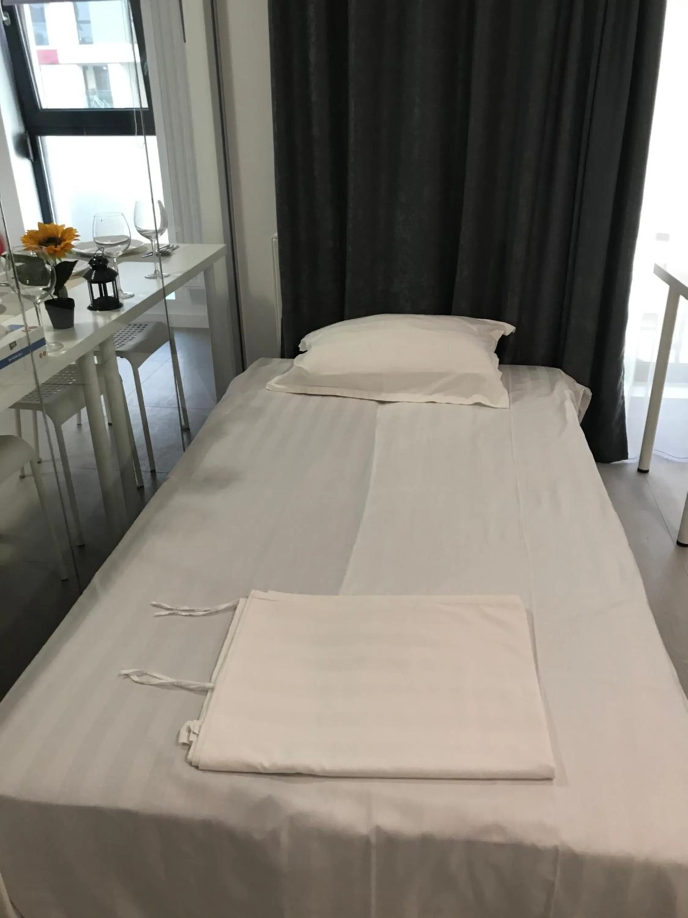 Bed in 21 Residence Apartments