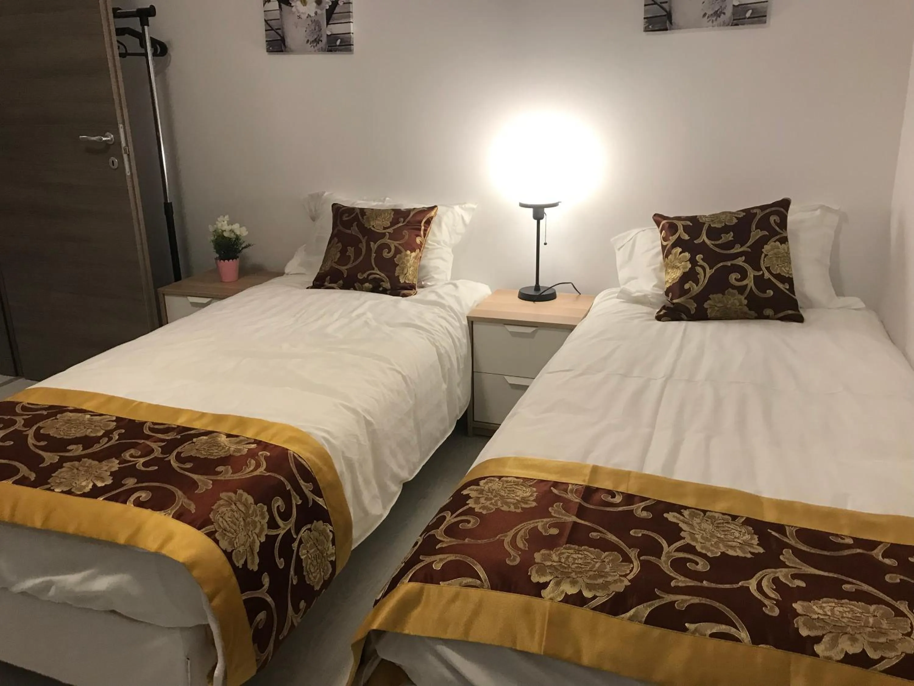 Bed in 21 Residence Apartments