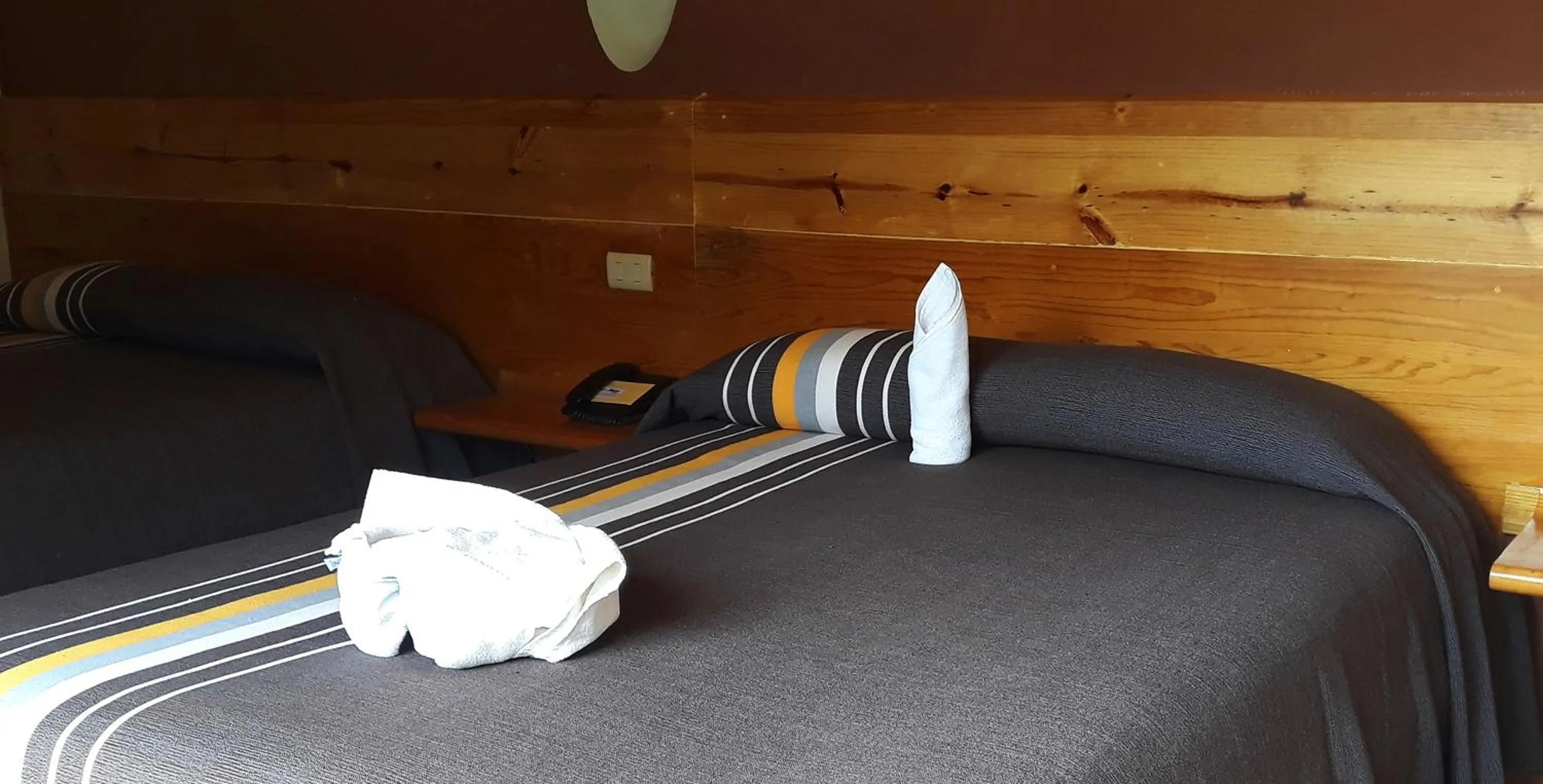 Bed in Axkan Arte Hotel