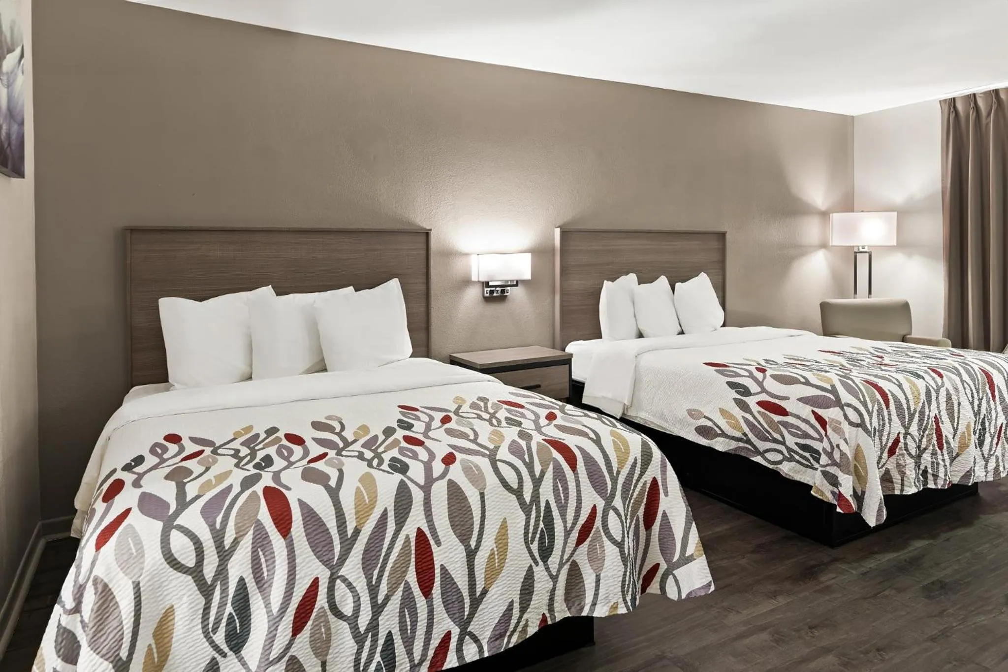 Photo of the whole room, Bed in Red Roof Inn & Suites Monroe, NC