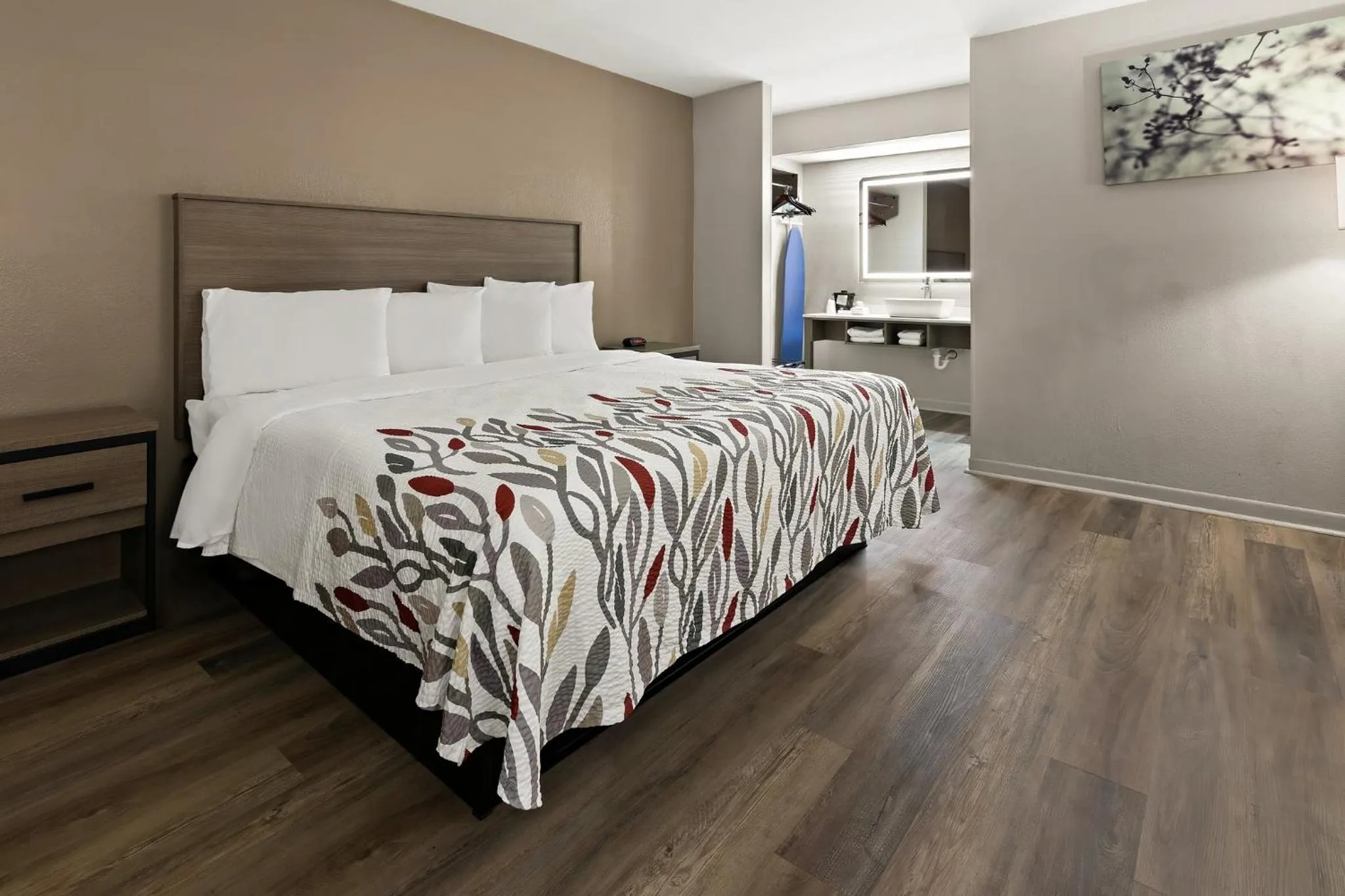 Photo of the whole room, Bed in Red Roof Inn & Suites Monroe, NC