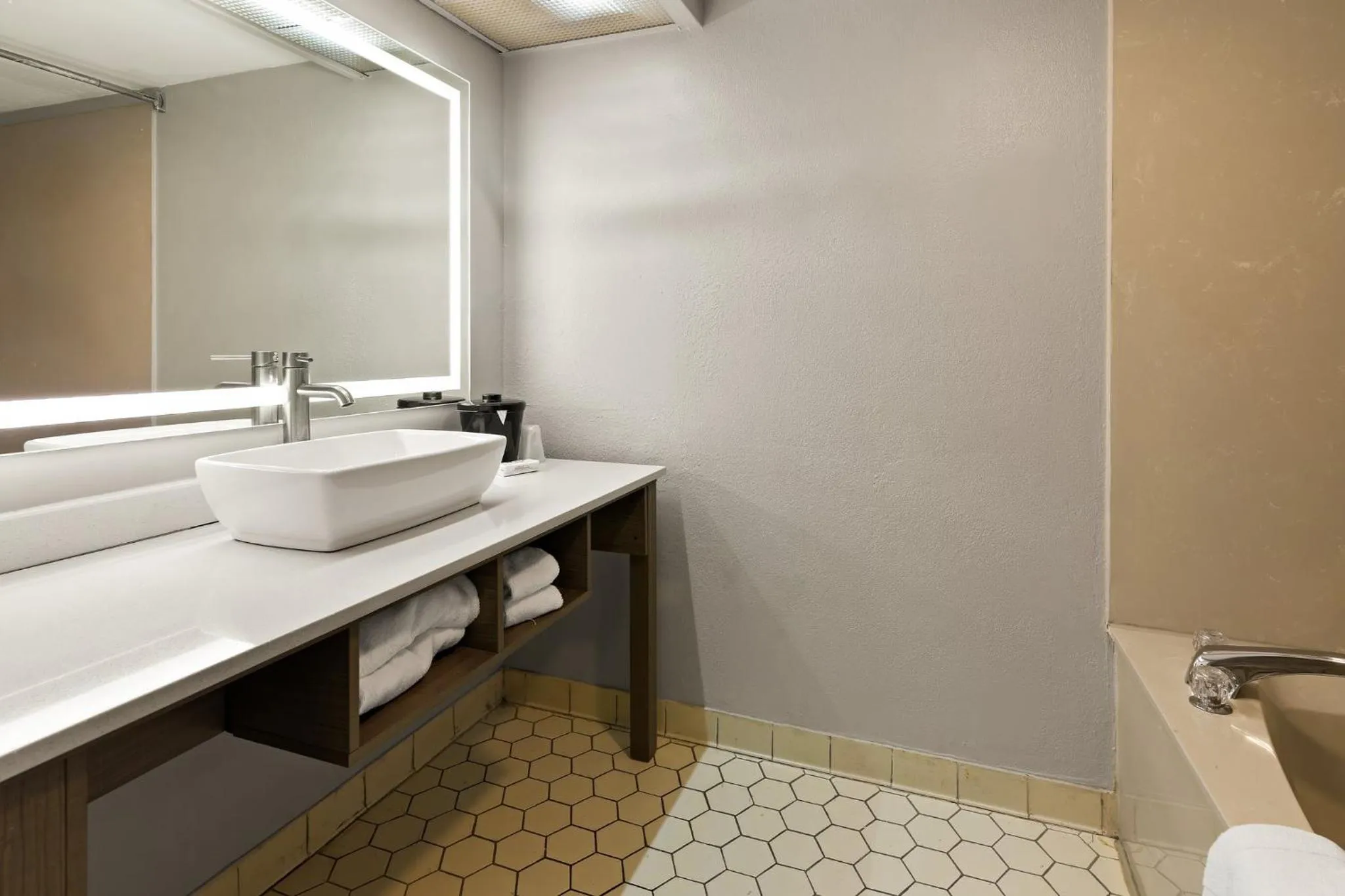 Bathroom in Red Roof Inn & Suites Monroe, NC