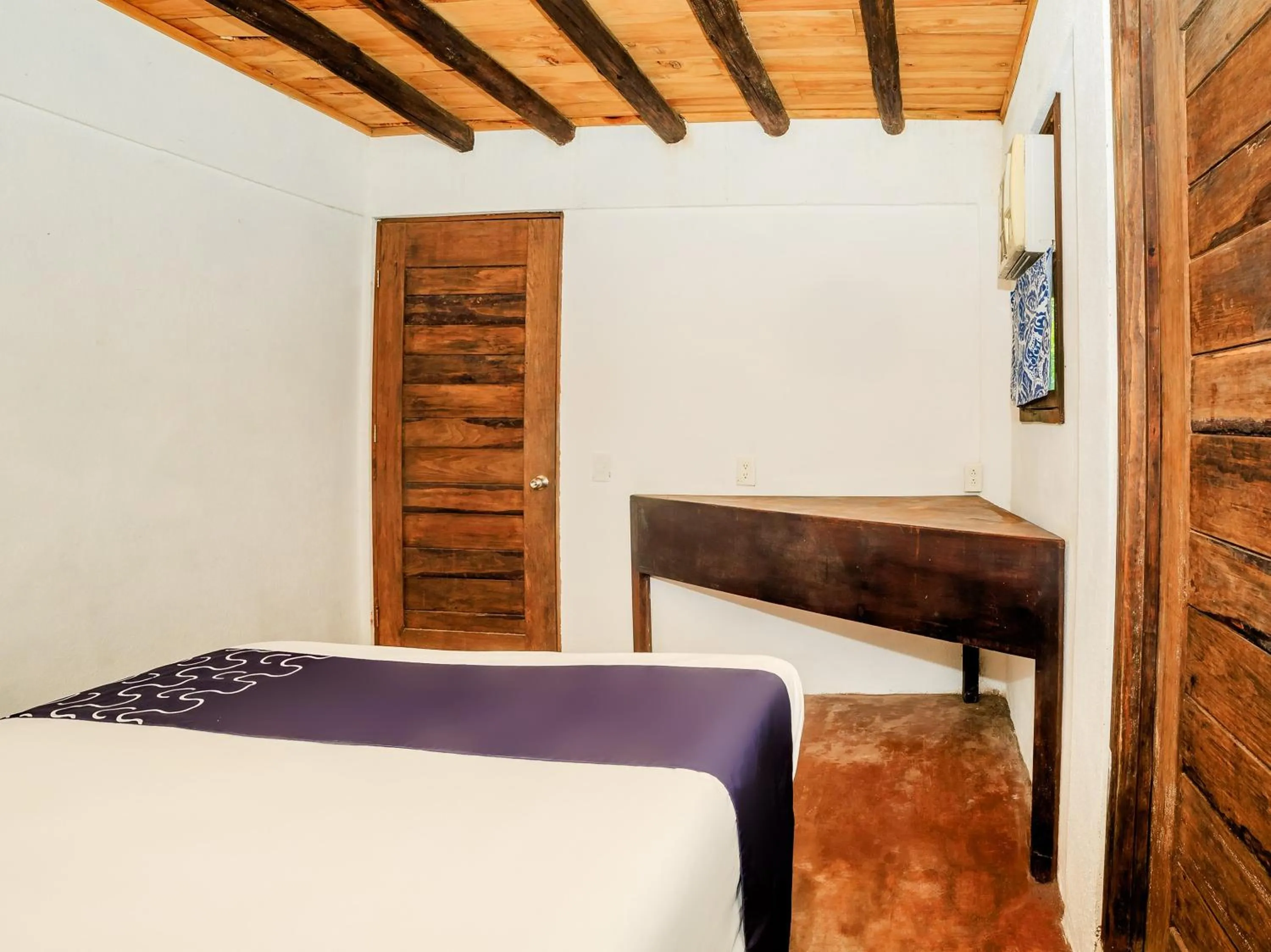 Bedroom in Capital O Verdemar, Pie de la Cuesta